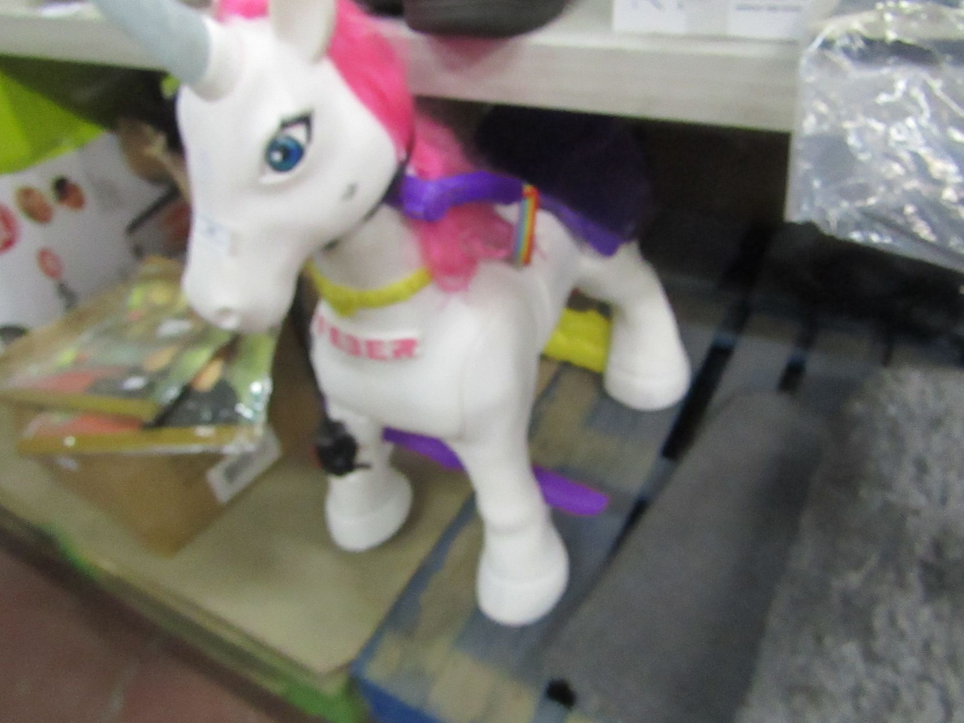 Feber Electric Ride on Unicorn, unchecked, comes with Charger
