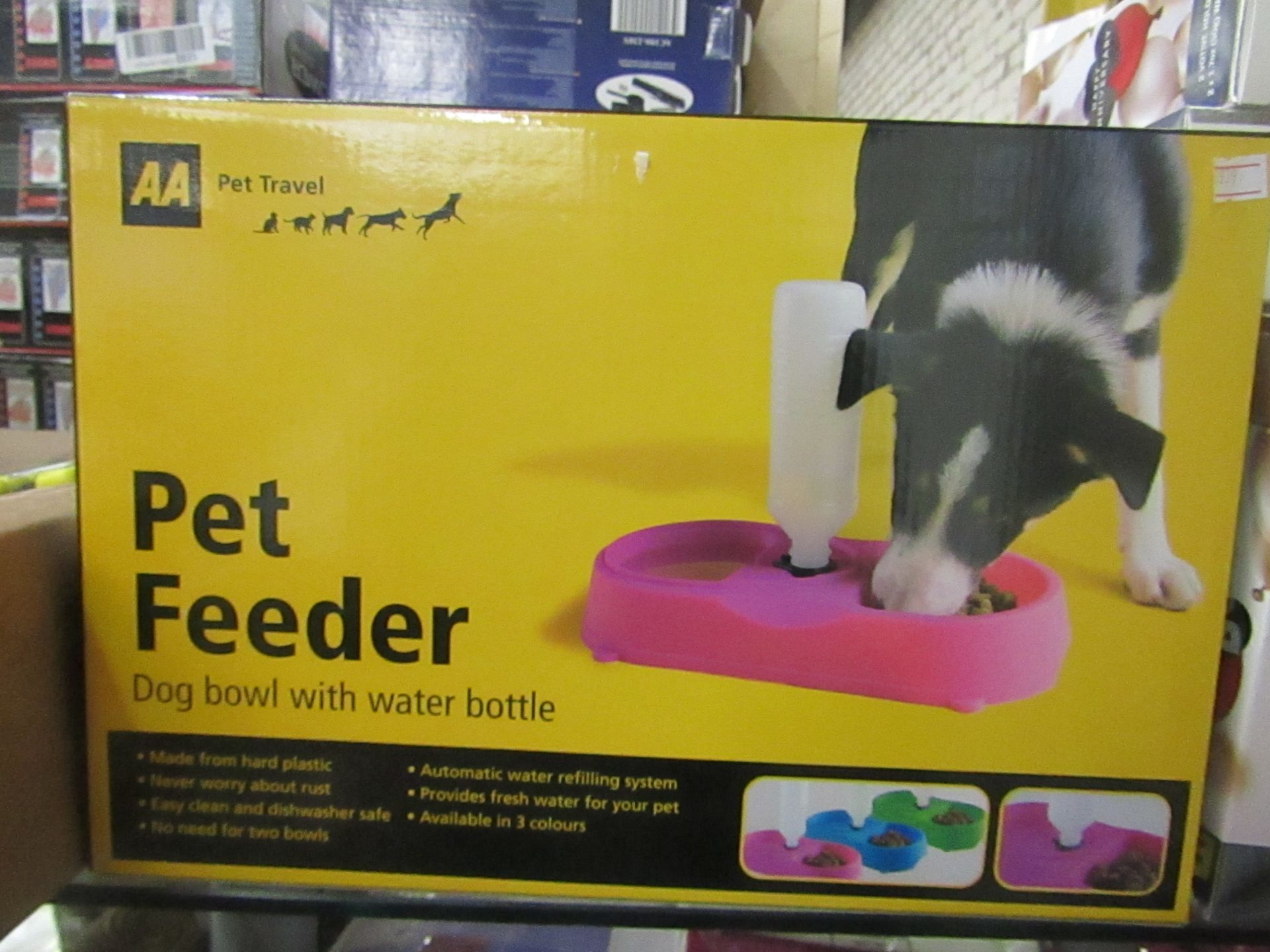 AA Pet Travel dog feeder comes with dog bowl and water bottle , seems unused and boxed.