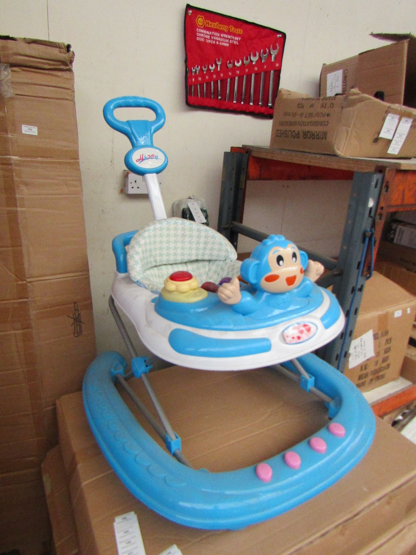 Childs Lights and sounds Baby Walker, new and boxed