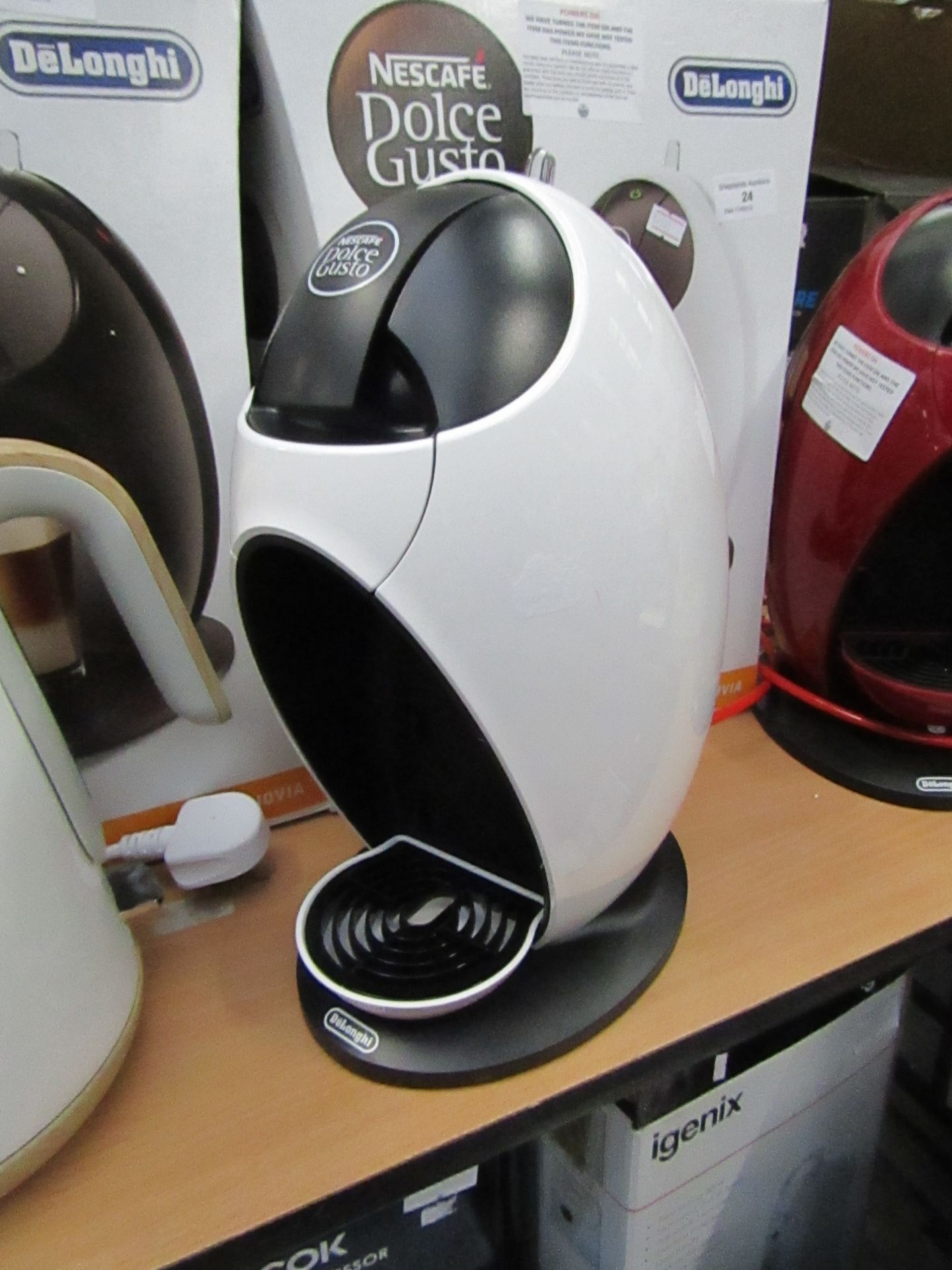 Delonghi espresso machine, powers on and boxed