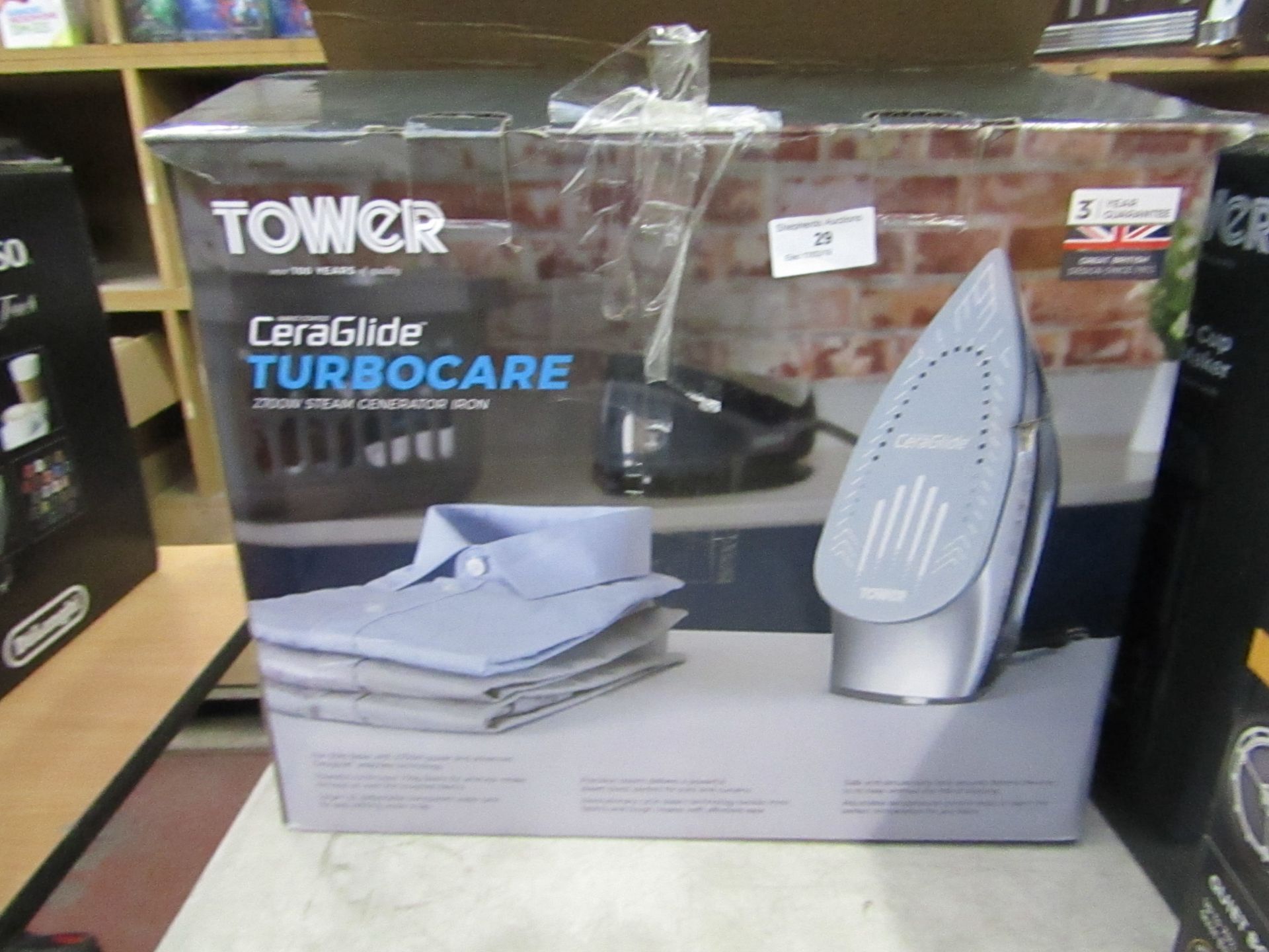 Tower Ceraglide steam iron, powers on and boxed