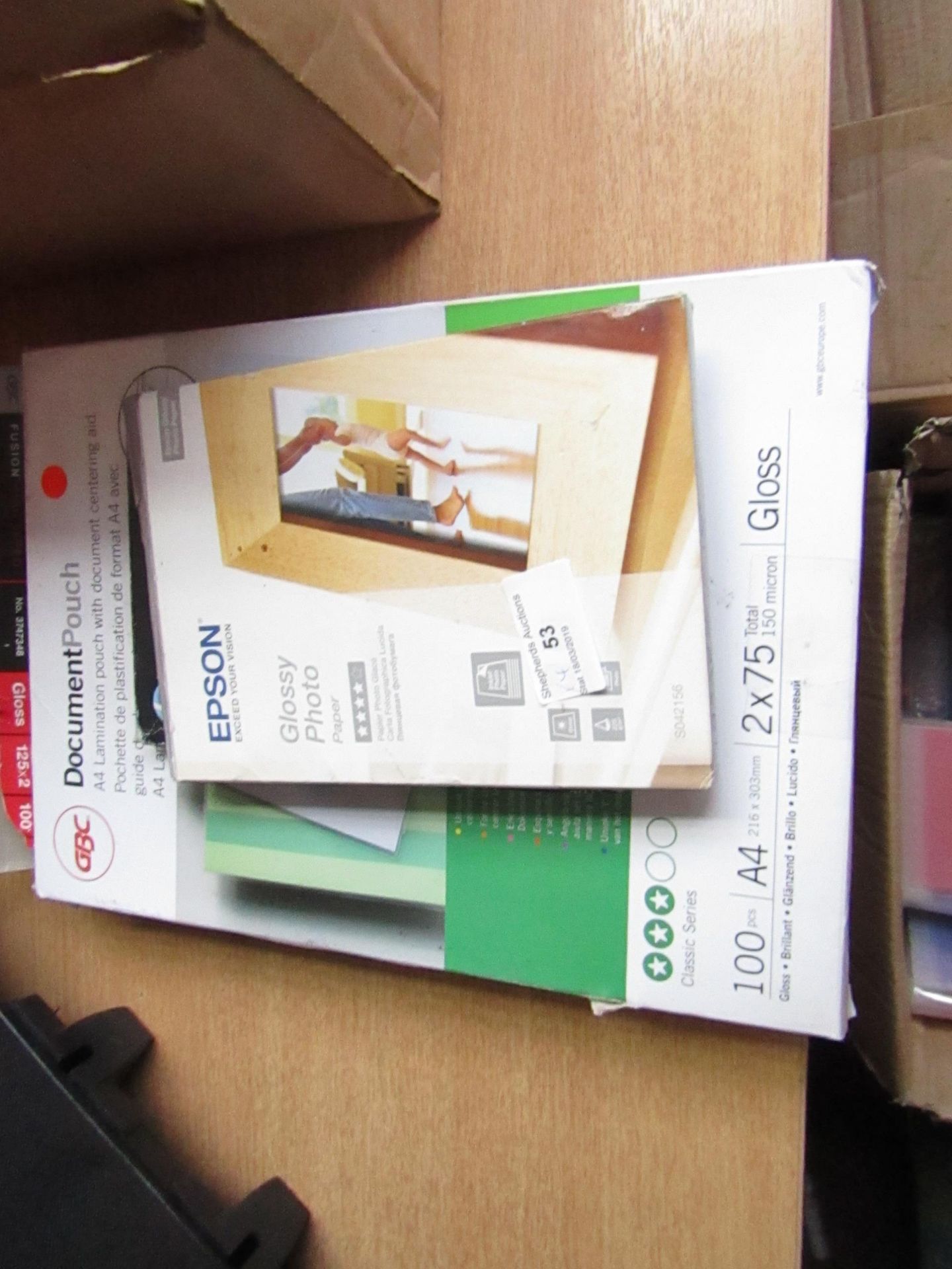 3x Items being a pack of A4 laminating pouches and 2x Packs of Photo Paper