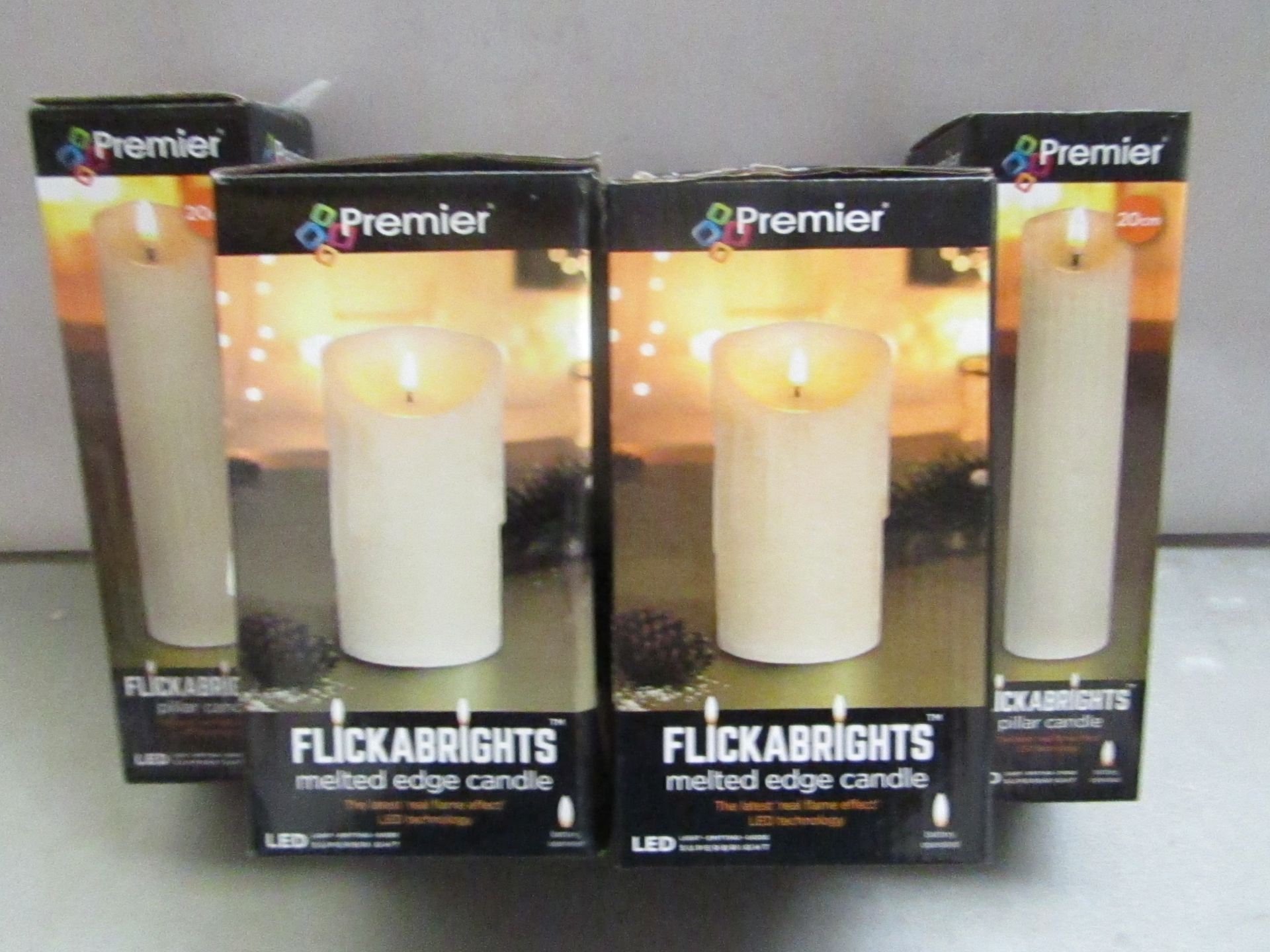 4 x Flickabrights Candles. 2 x Pillar candles 20cm . 2 x Melted Edge candles 18cm. LED in box