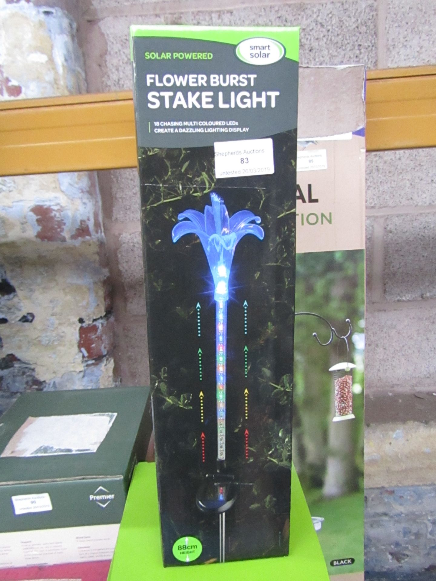 Solar powered flower burst stake light boxed and unchecked