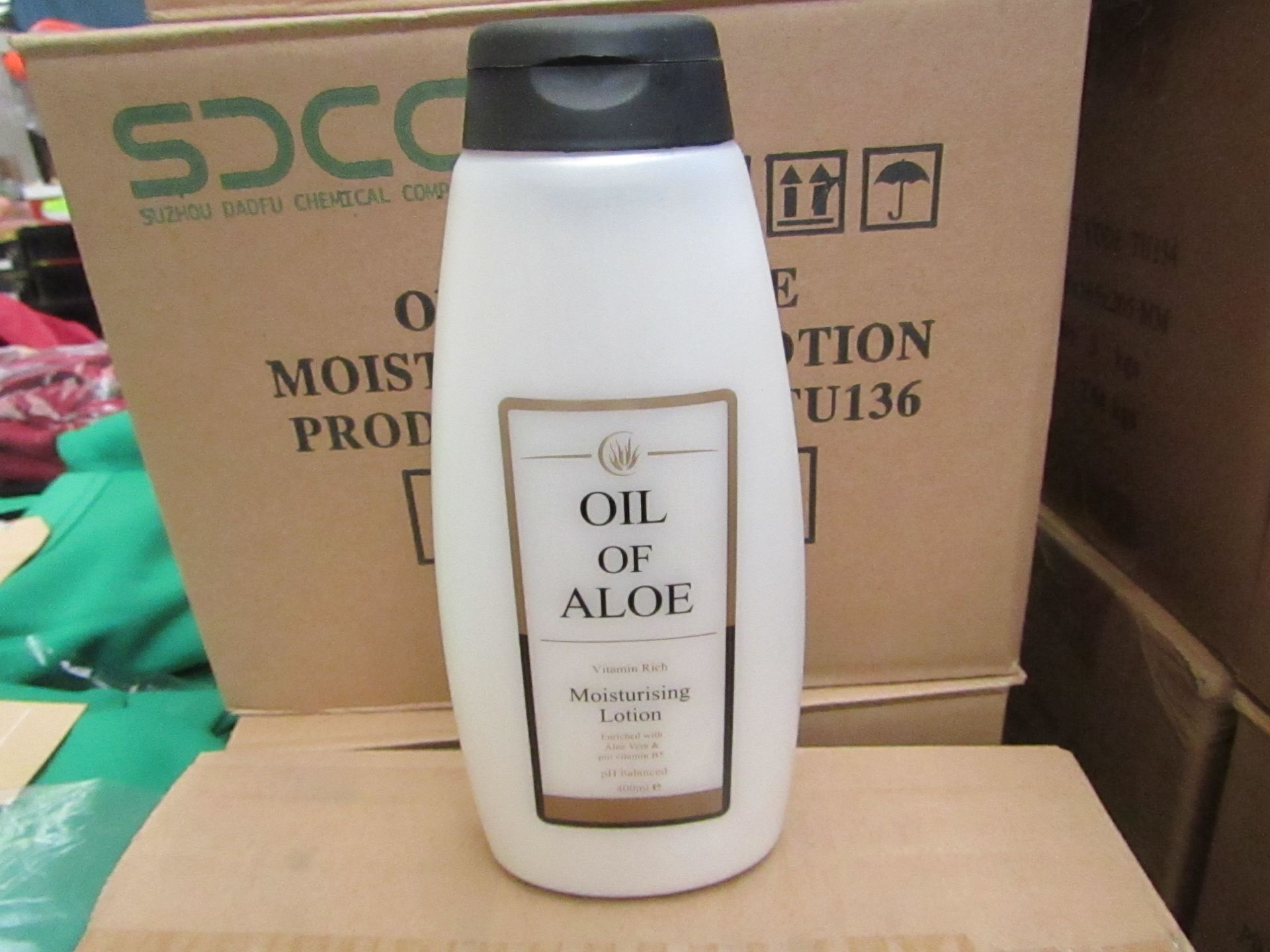 12 x 400ml Oil Of Aloe moisturising Lotion, unused and boxed.