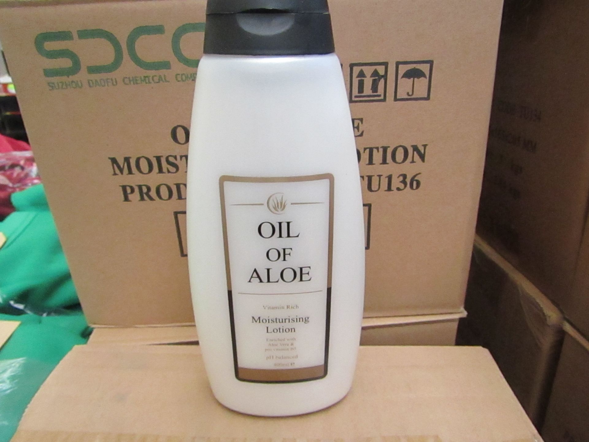 12 x 400ml Oil Of Aloe moisturising Lotion, unused and boxed.