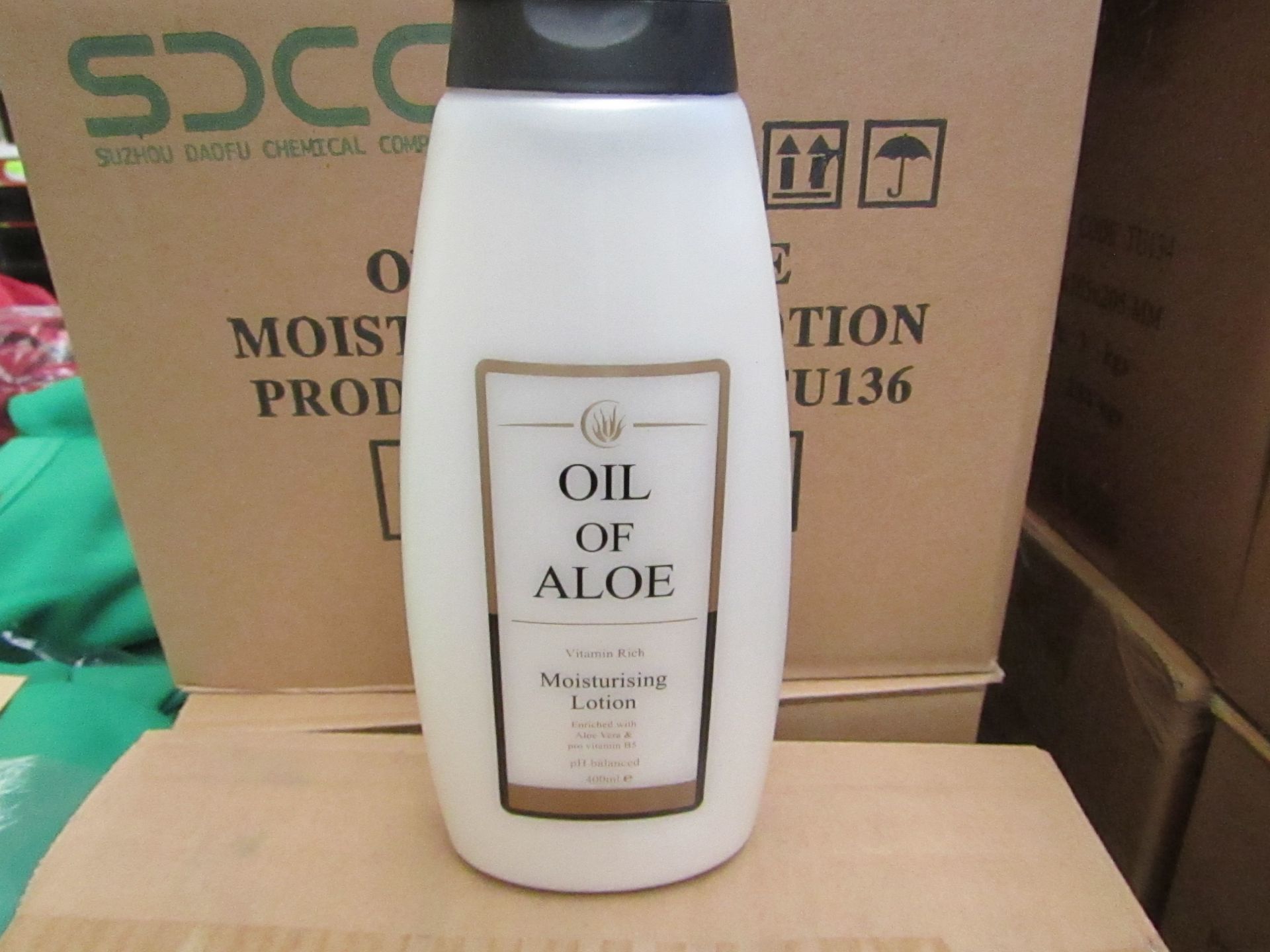 12 x 400ml Oil Of Aloe moisturising Lotion, unused and boxed.