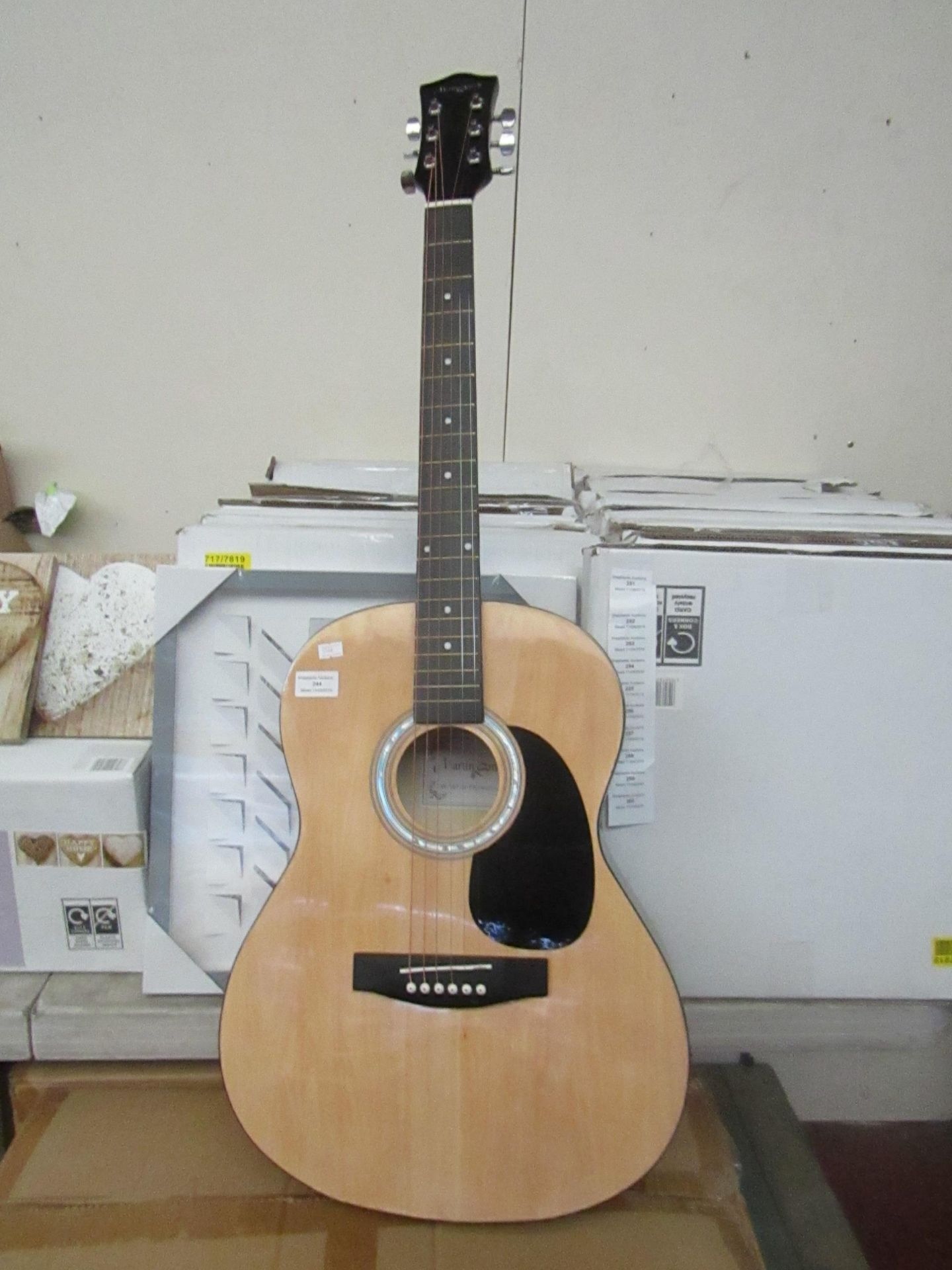 Martin Smith acoustic guitar, no major damage.