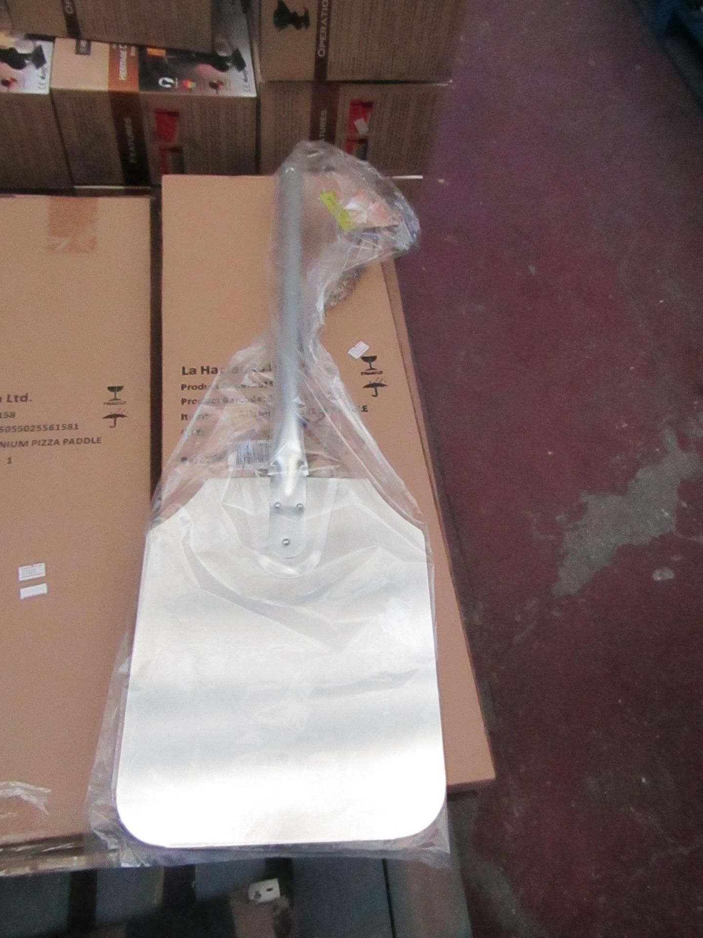 8x Aluminium pizza paddles, new and boxed.