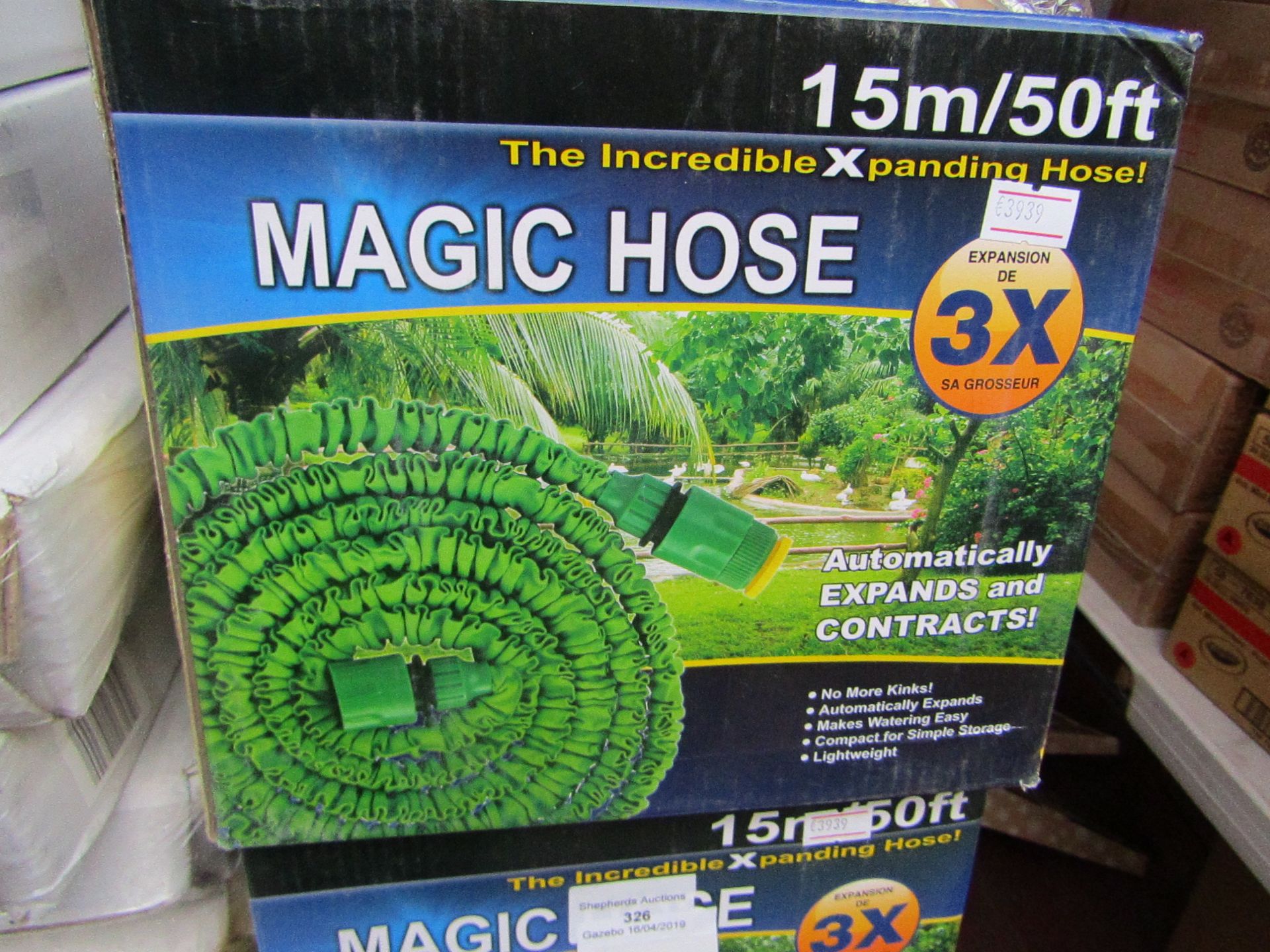 50ft Magic expanding hose pipe, new and boxed comes with multi function hose trigger gun.