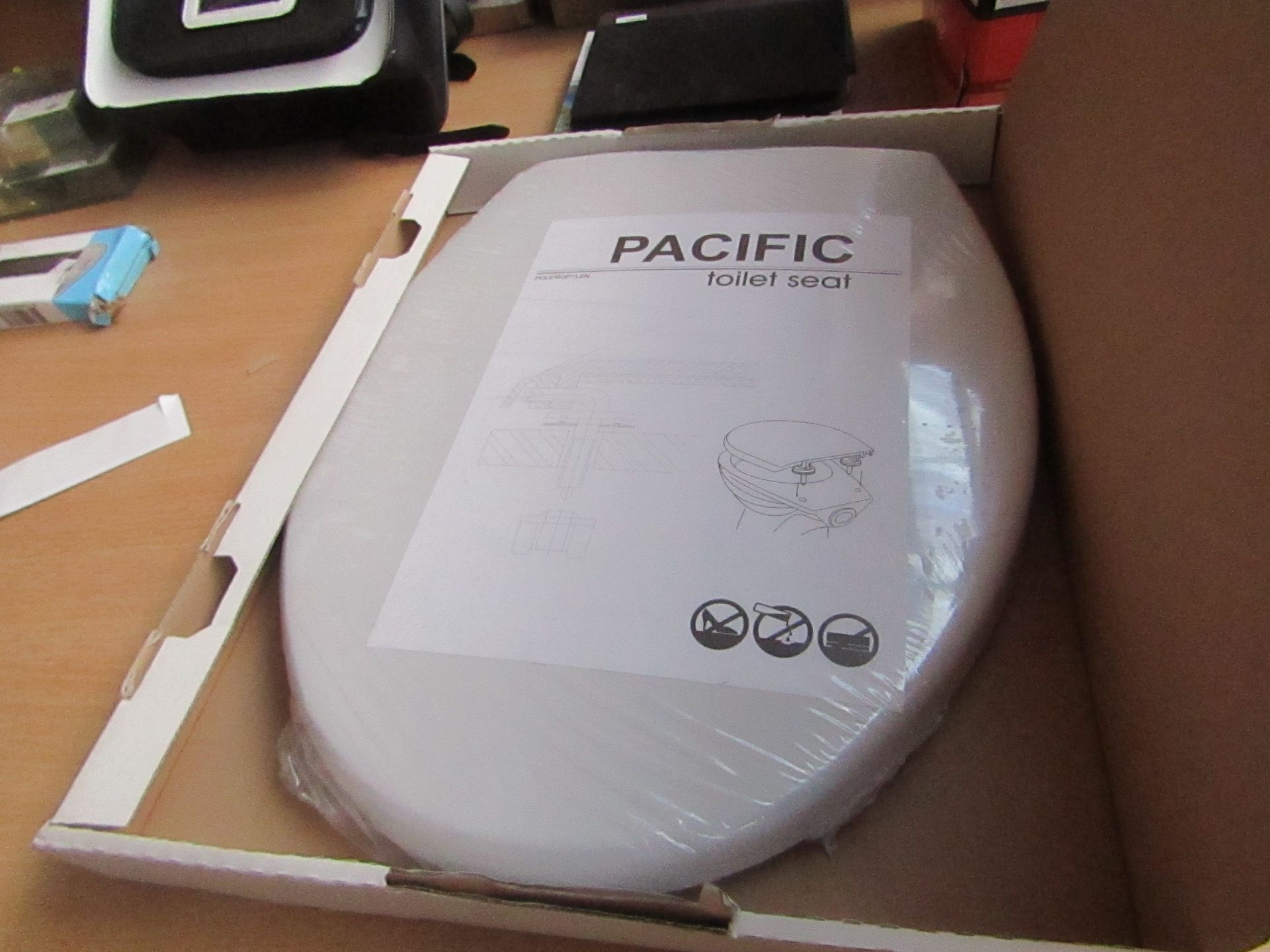 Pacific Toilet Seat, new in box