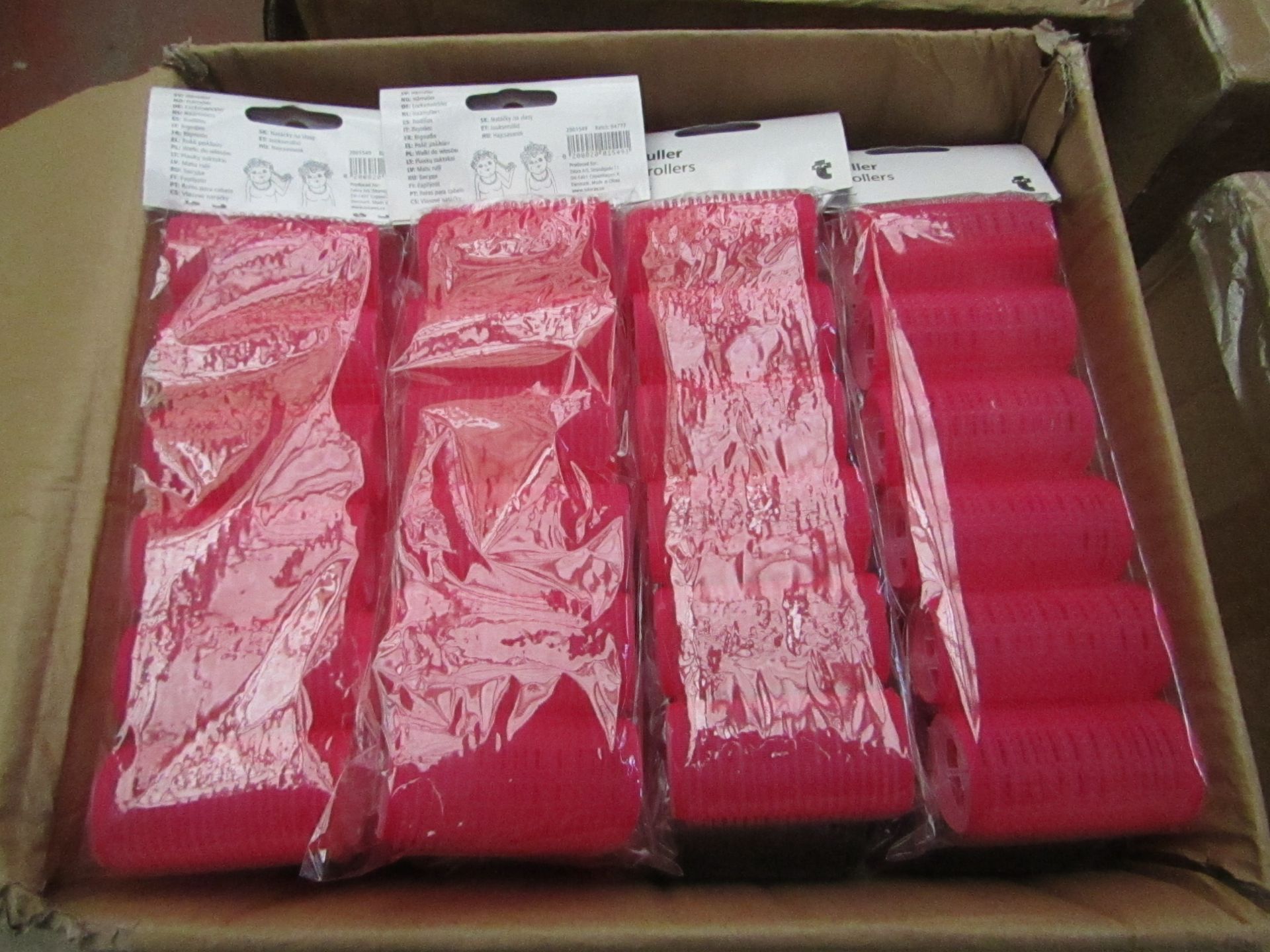 2x Boxes each containing 24 pink hair rollers, all new and packaged.