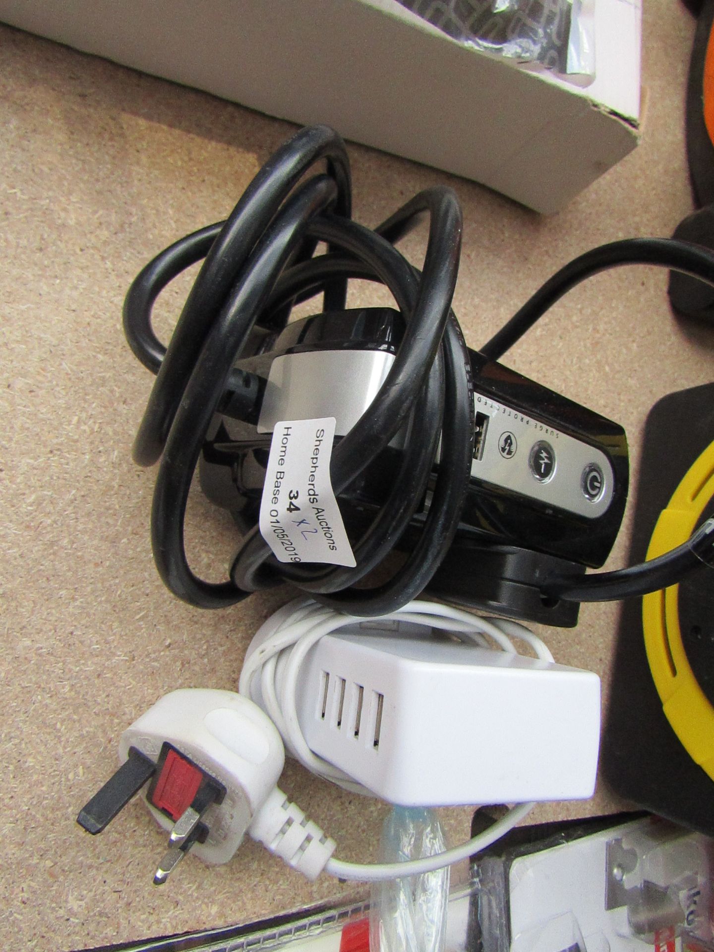 2x items being a Surge protector ex tension lead with USB ports and a 4 Usb extension lead, both