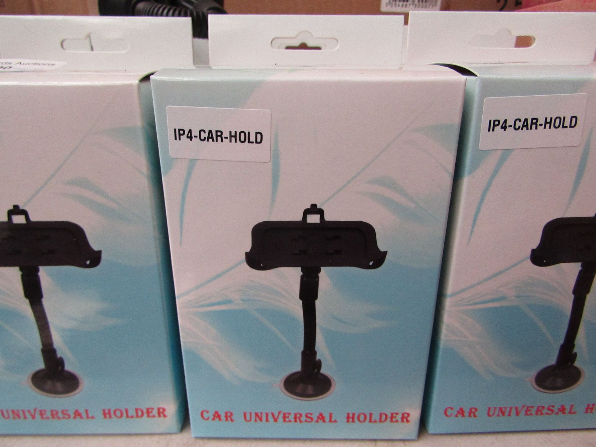 19 x Universal car holders new in box.