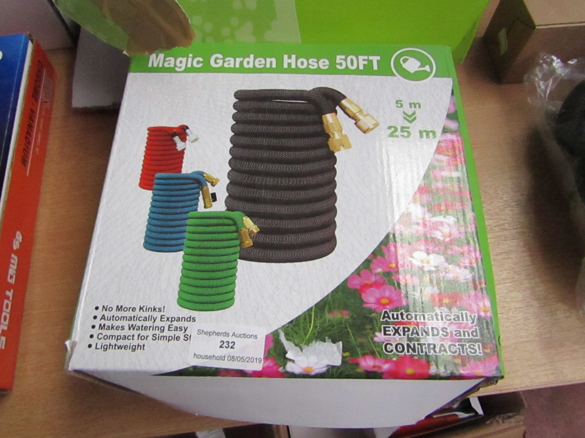 Magic garden hose 50ft, new and boxed.