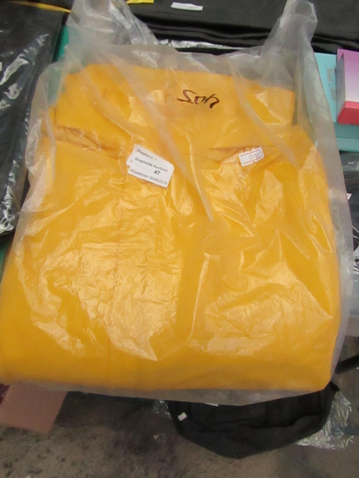 Yellow over clothes bib and brace, size XL, new and packaged.