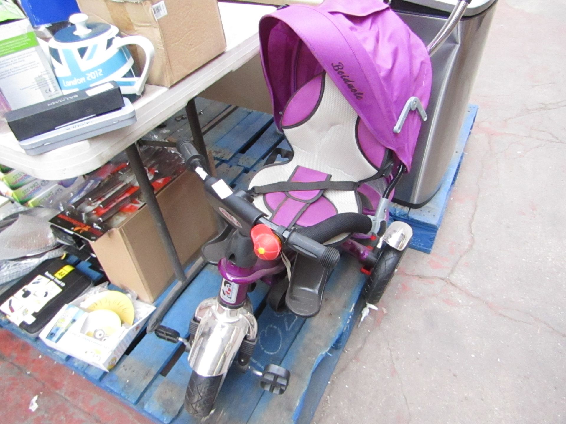 Childrens trike, complete but needs to be built properly as it is unusable.