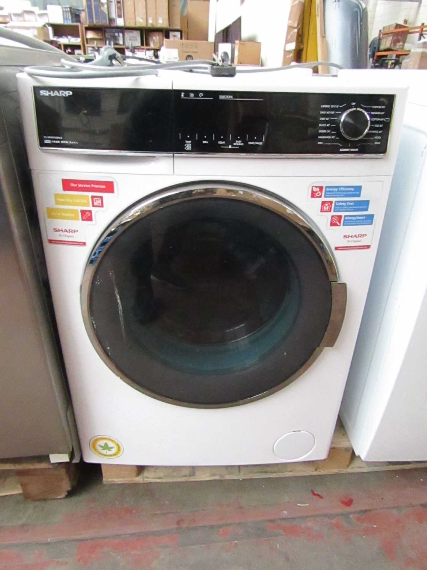 Sharp 9kg 1400 rpm a+++ washing machine, powers on and spins.