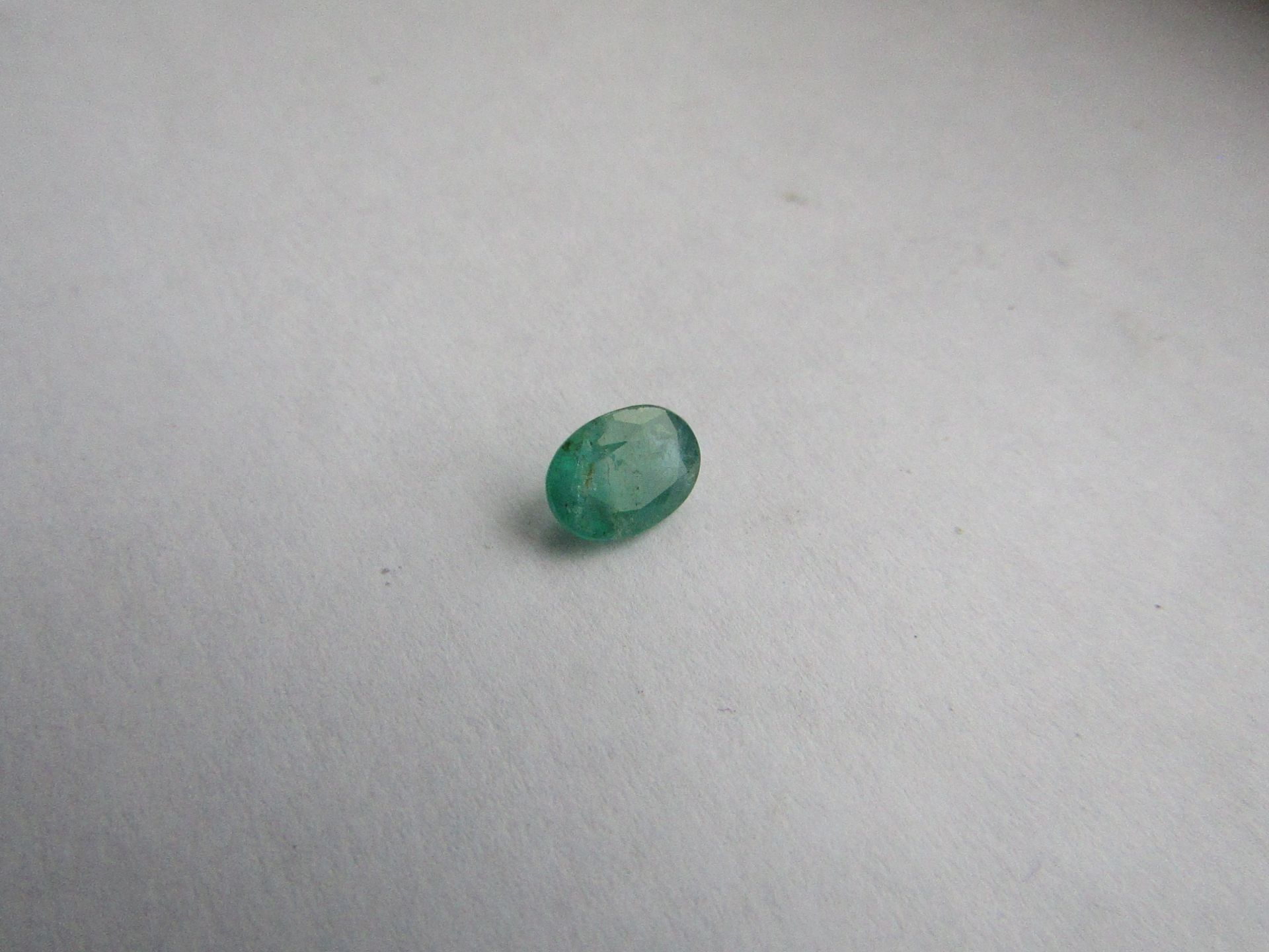 Natural Emerald Weight 0.76 Carat Colour: 088- medium Dark Green; Strong Clarity: I1, Included 1