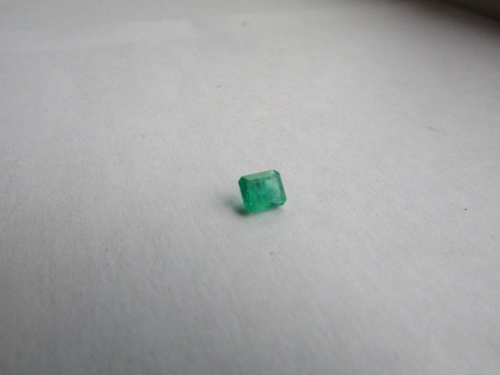 Natural Emerald Weight 0.56 Carat Colour: 088- medium Dark Green; Strong Clarity: I1, Included 1