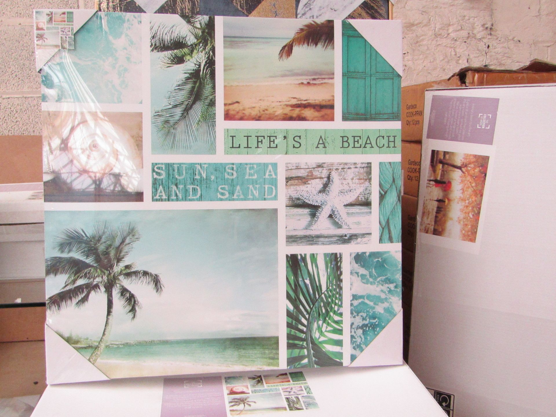 2 x Life's A Beach Wall Art, Approx size 60 x 60 cms, new and sealed in box.The collection by ARGOS