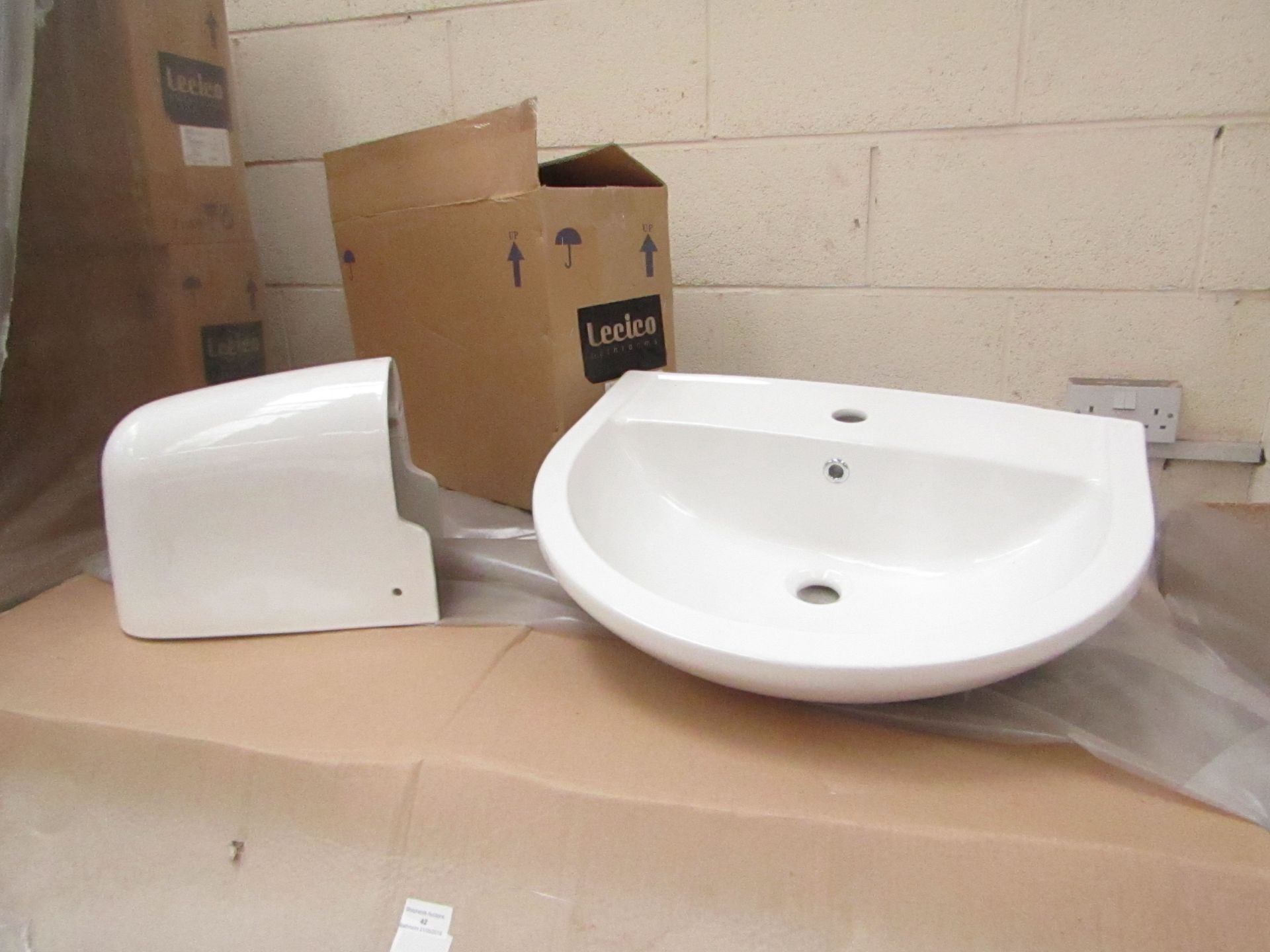 Lecico Remini 59cm 1 tap hole basin with Remini semi pedestal, unused and boxed