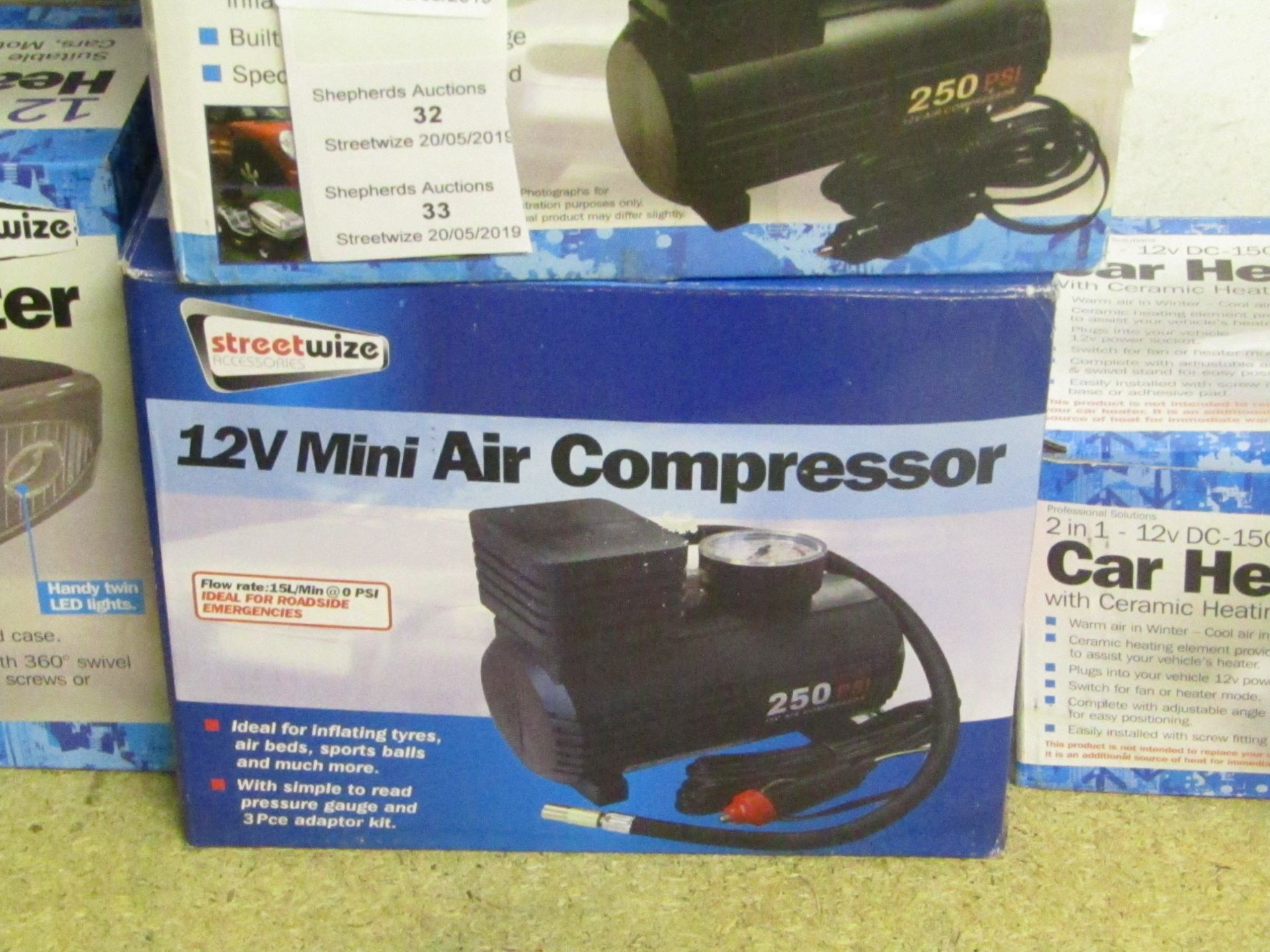 Streetwize 12v mini air compressor, unchecked and boxed.