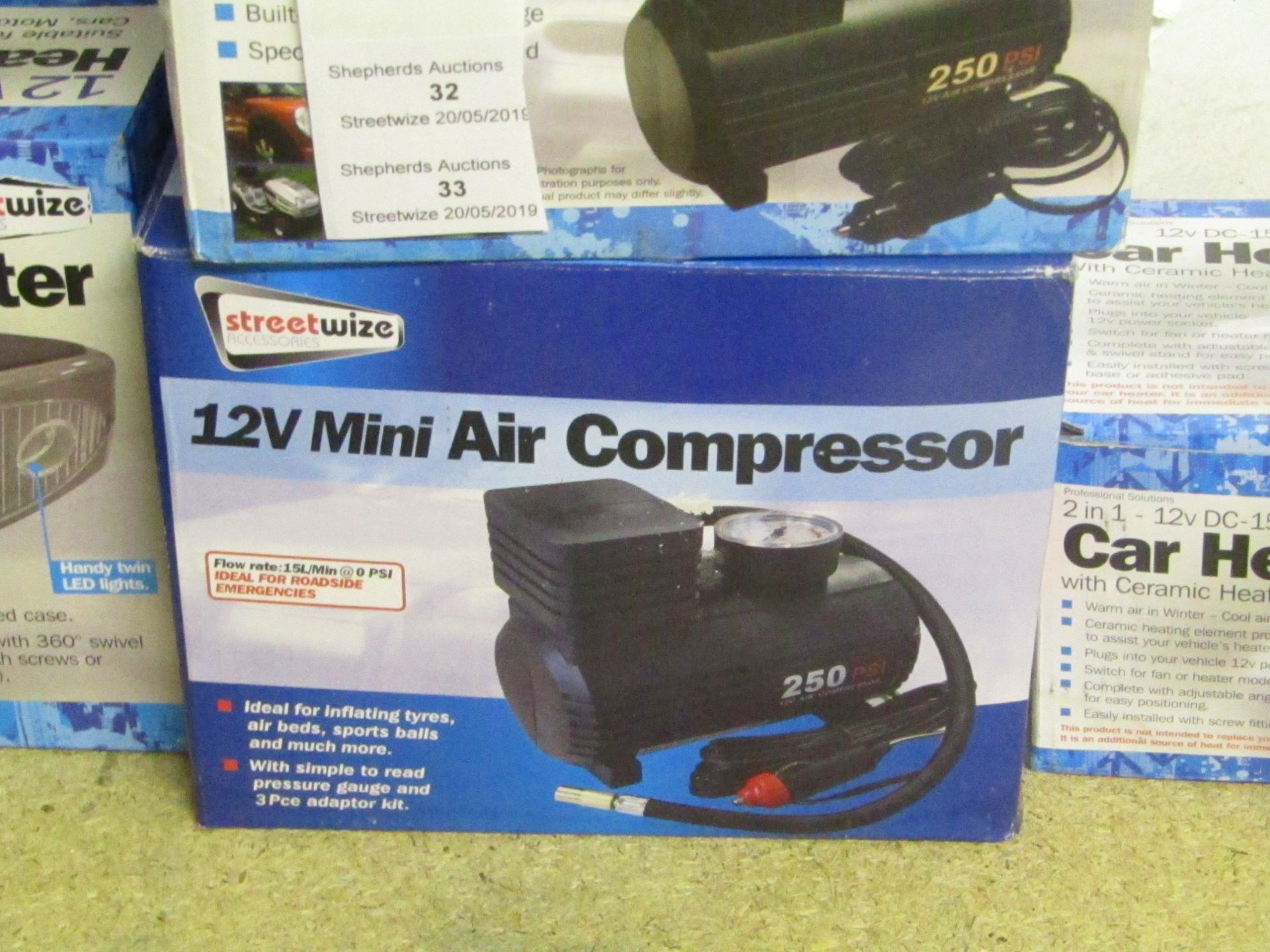 Streetwize 12v mini air compressor, unchecked and boxed.