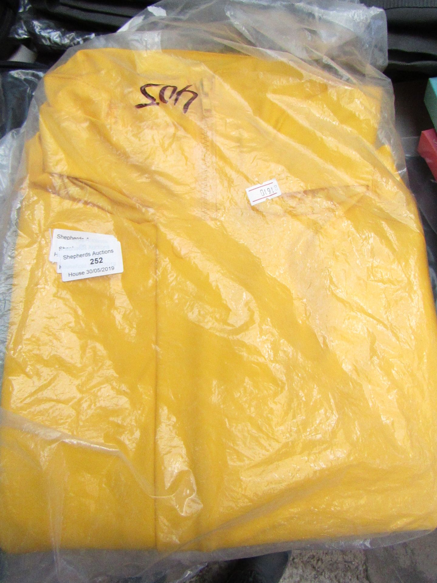 Yellow over clothes bib and brace, size XL, new and packaged.