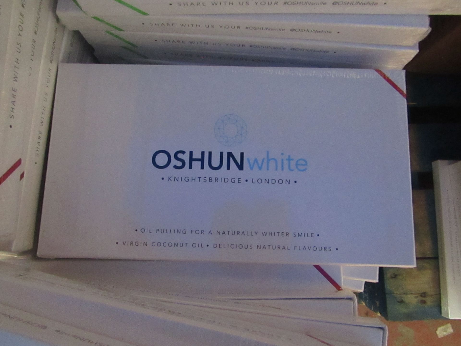 100 packs x Oshun White Teeth Whitening Wild Cherry Flavour BB May 2017 but completely sealed