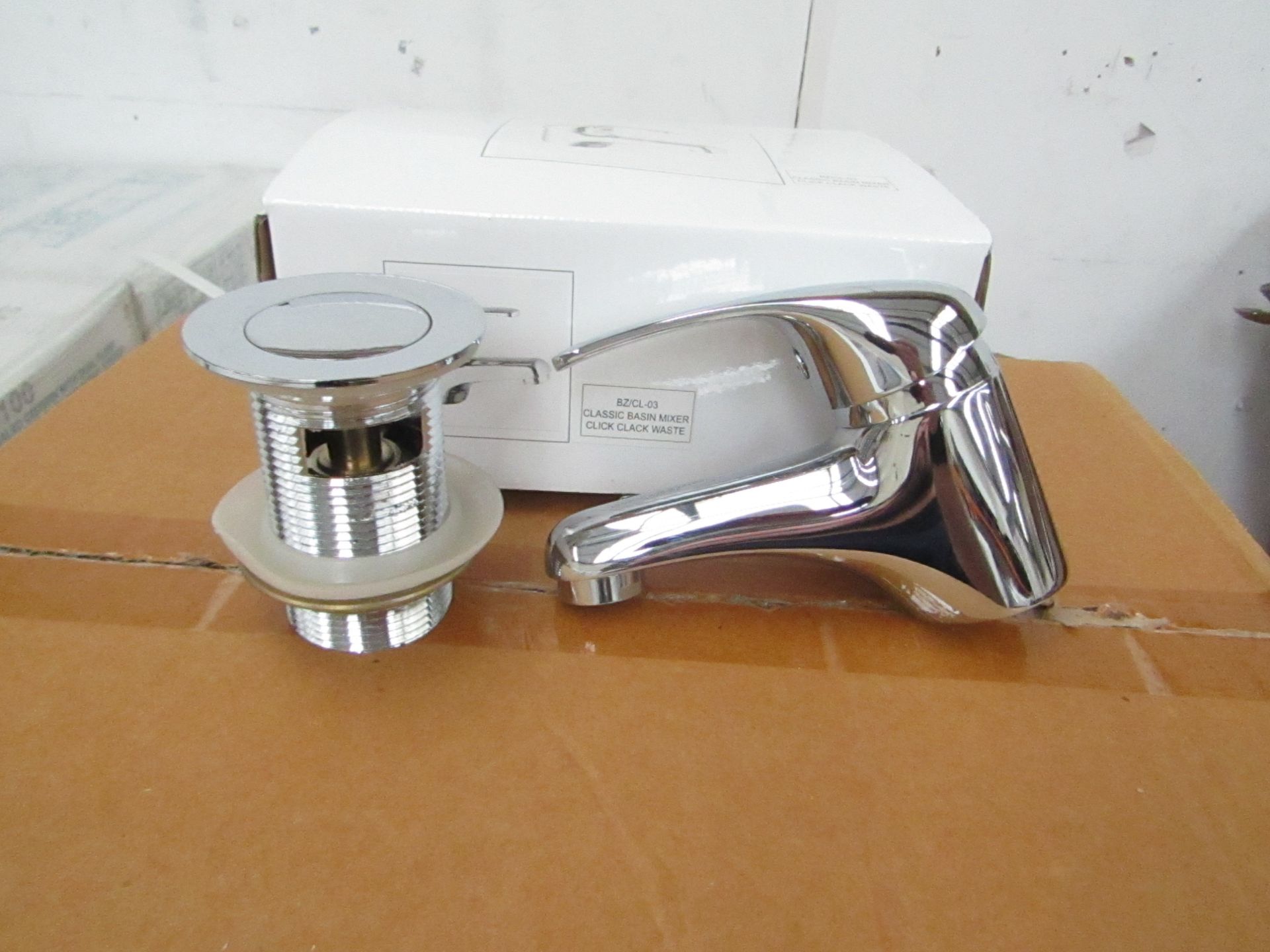 Classic Mono Block chrome plated Basin Mixer tap with chrome plated brass handle, includes click