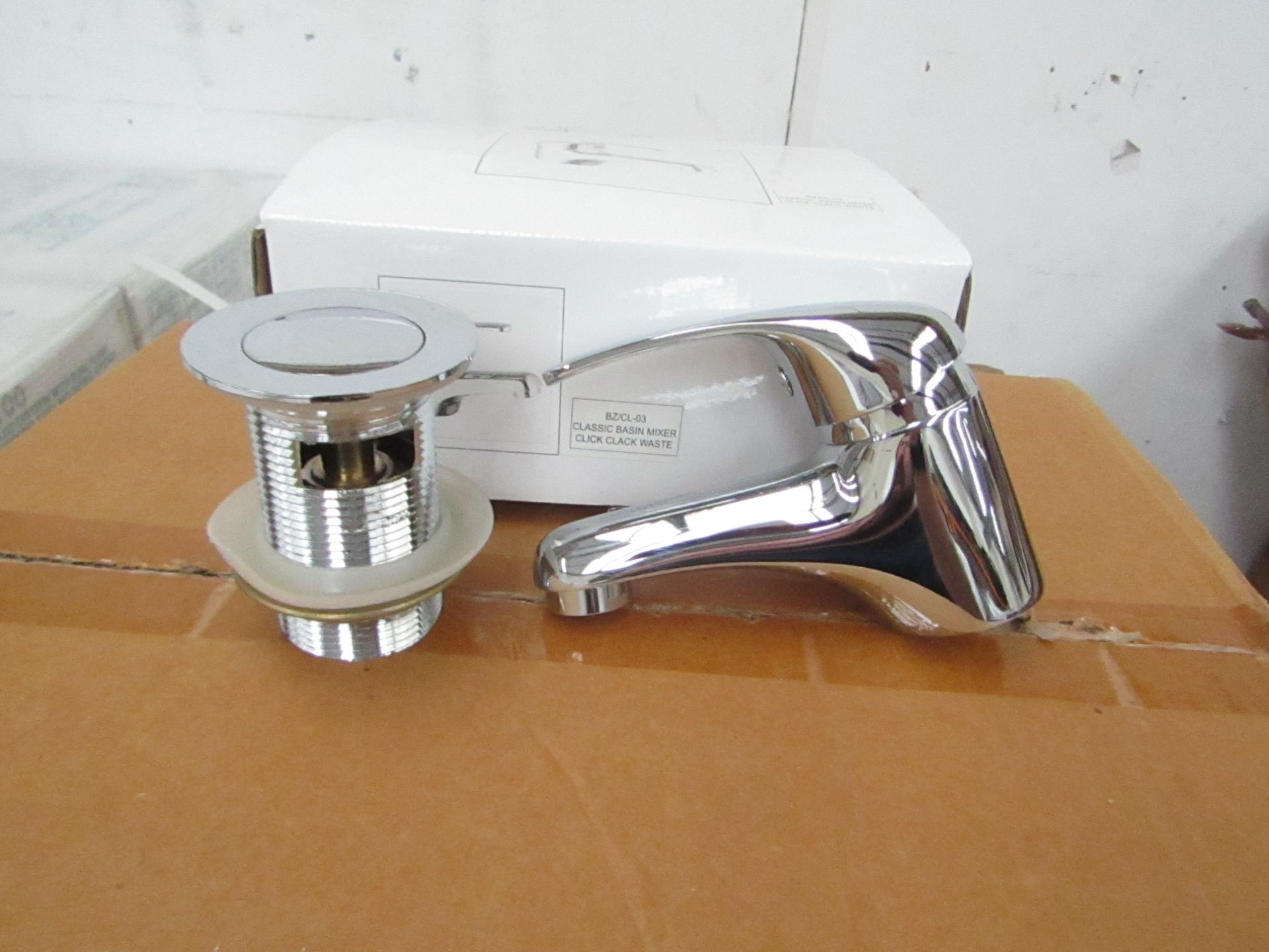 Classic Mono Block chrome plated Basin Mixer tap with chrome plated brass handle, includes click