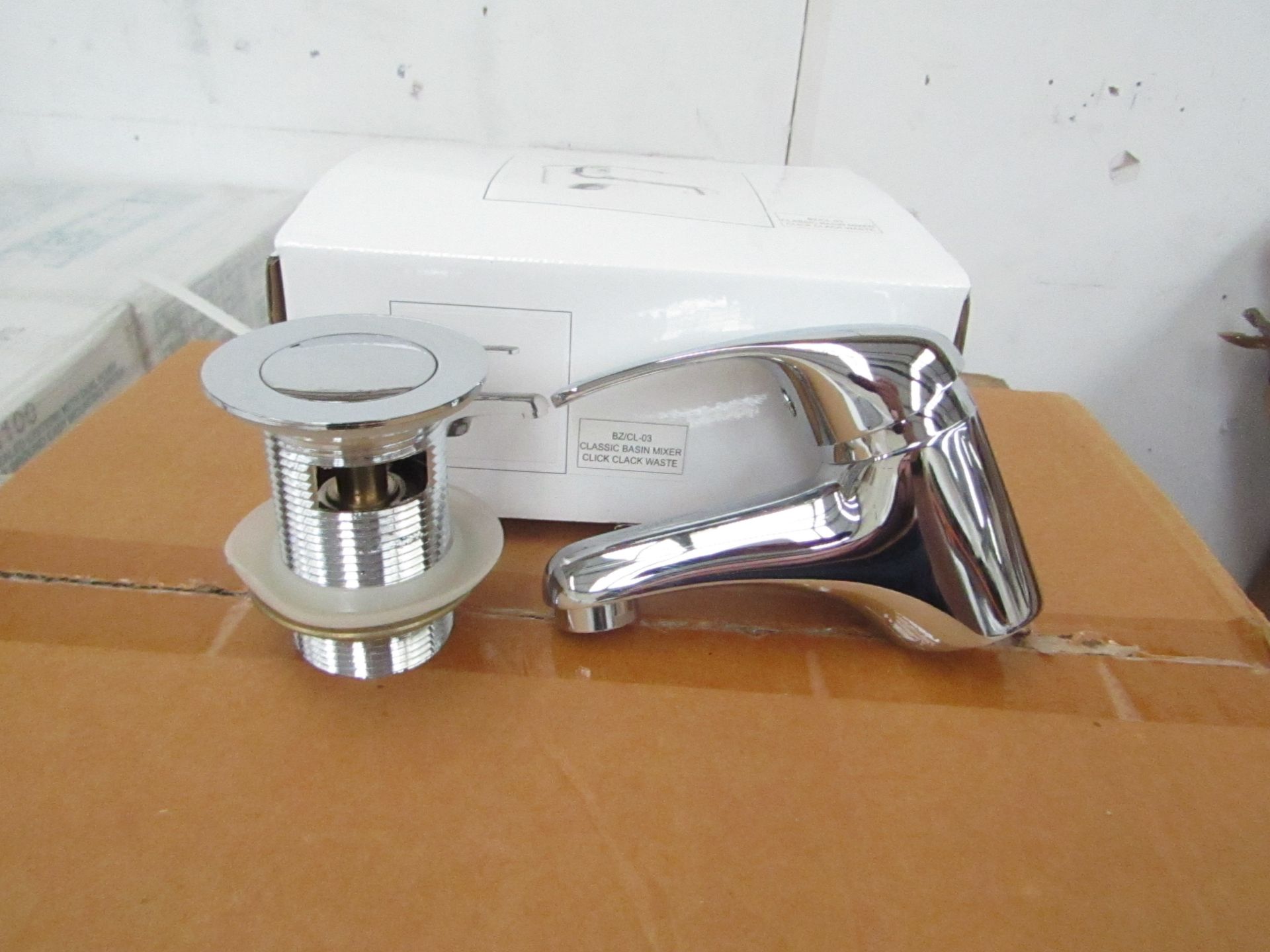 Classic Mono Block chrome plated Basin Mixer tap with chrome plated brass handle, includes click