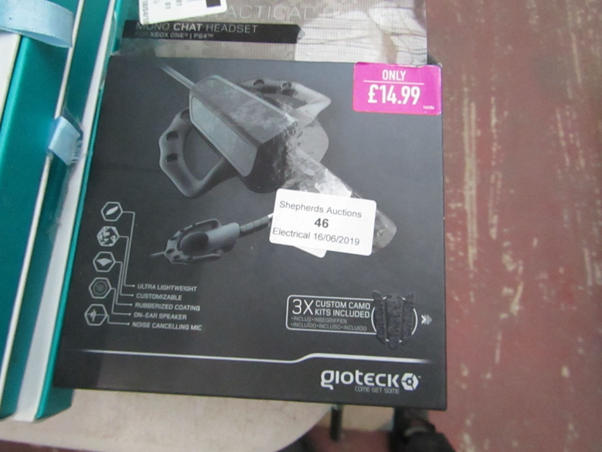 GioTeck mono chat headset, untested and boxed.