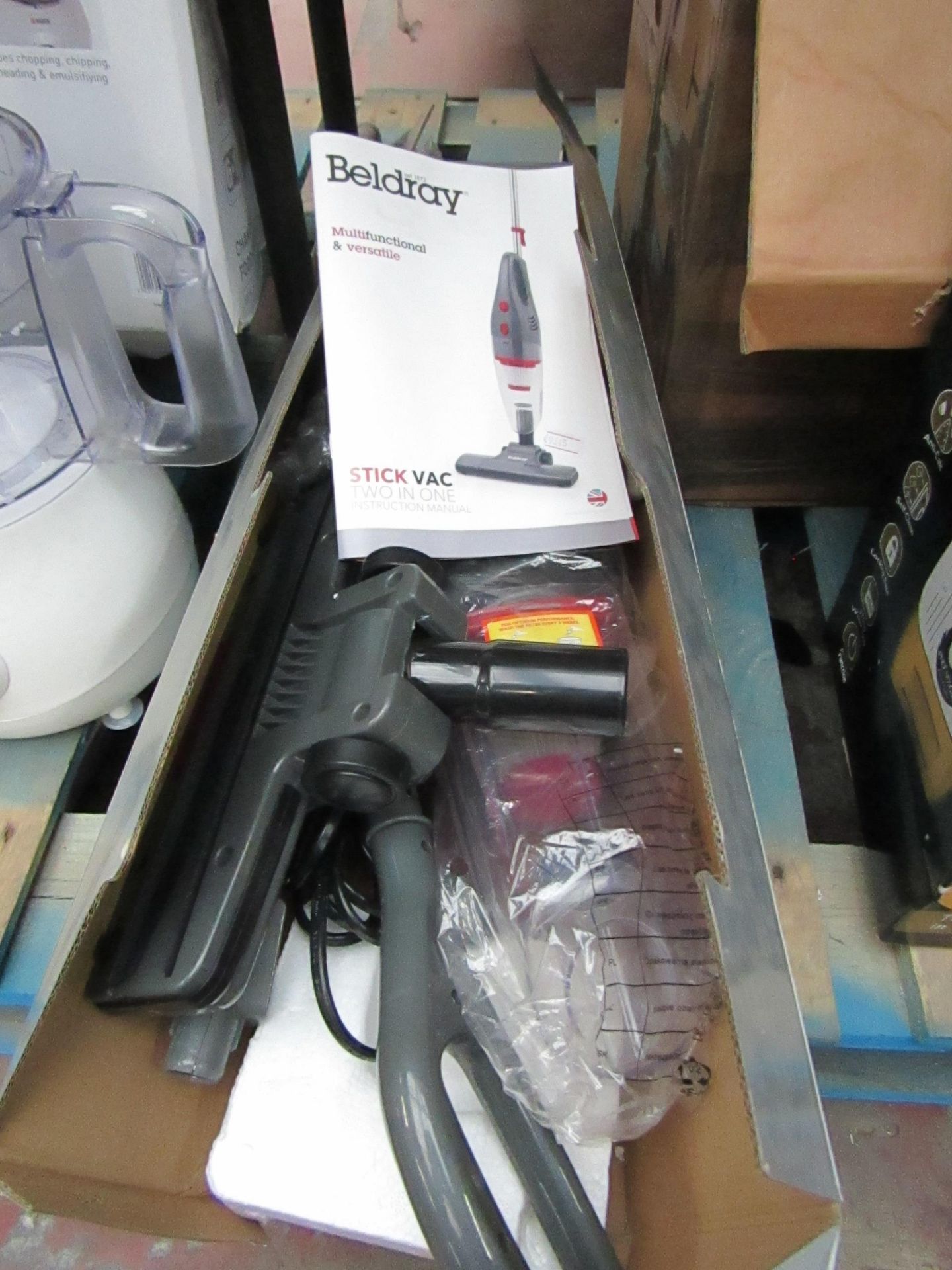 Beldray multifunctional stick vac, tested working and in damaged packaging.