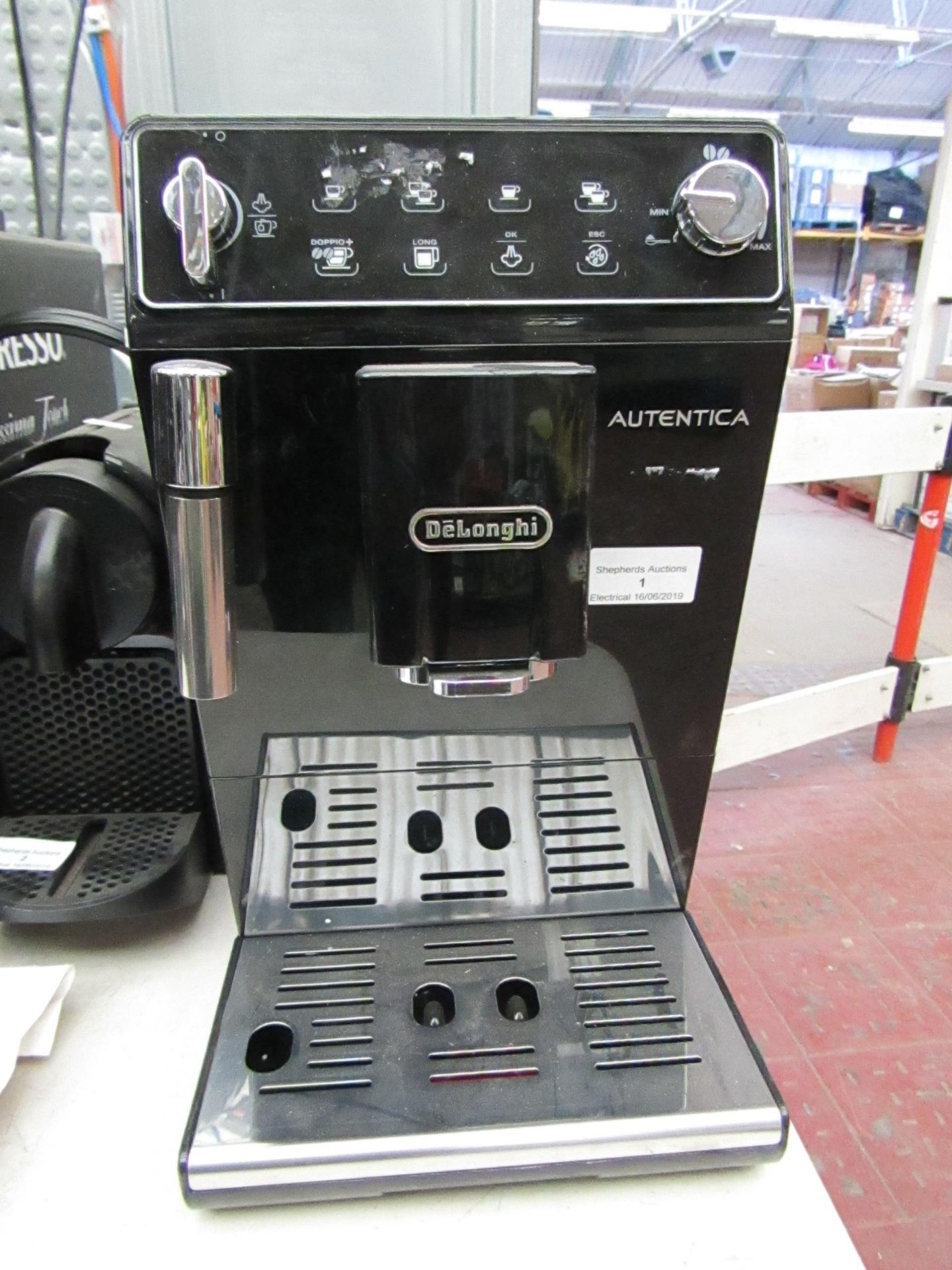 DeLonghi Autentica coffee machine, powers on.RRP £399.98