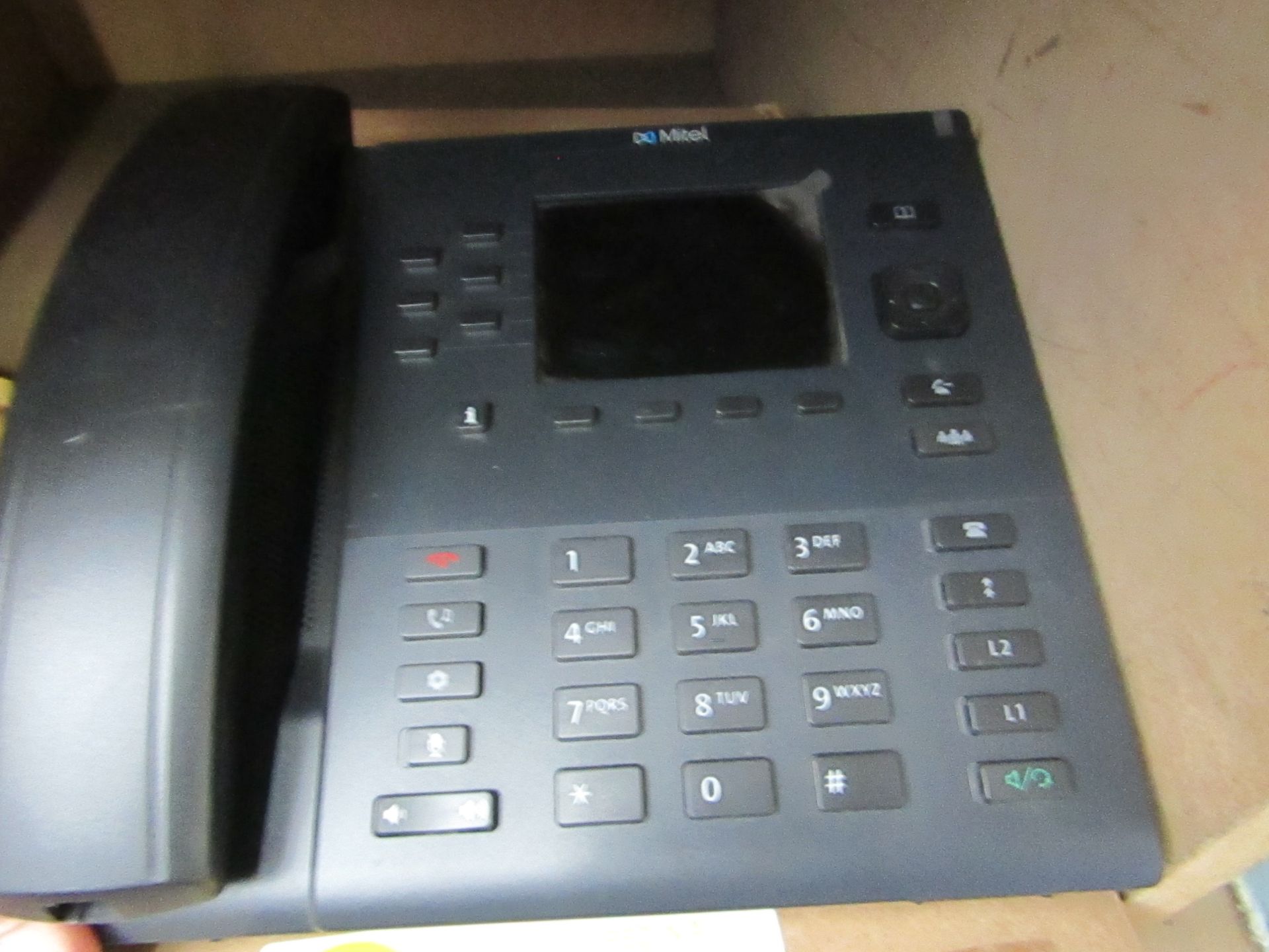 Mitel office phone set, grade B and boxed.