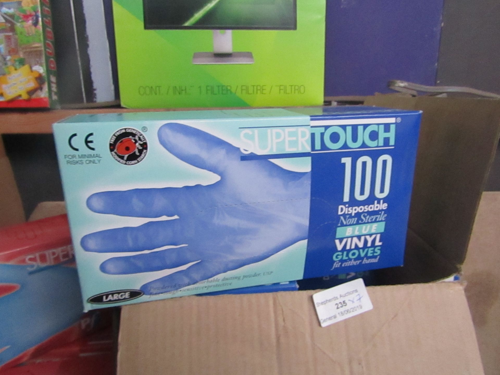 7 boxes of 100 super touch non sterile blue vinyl gloves,new in box
