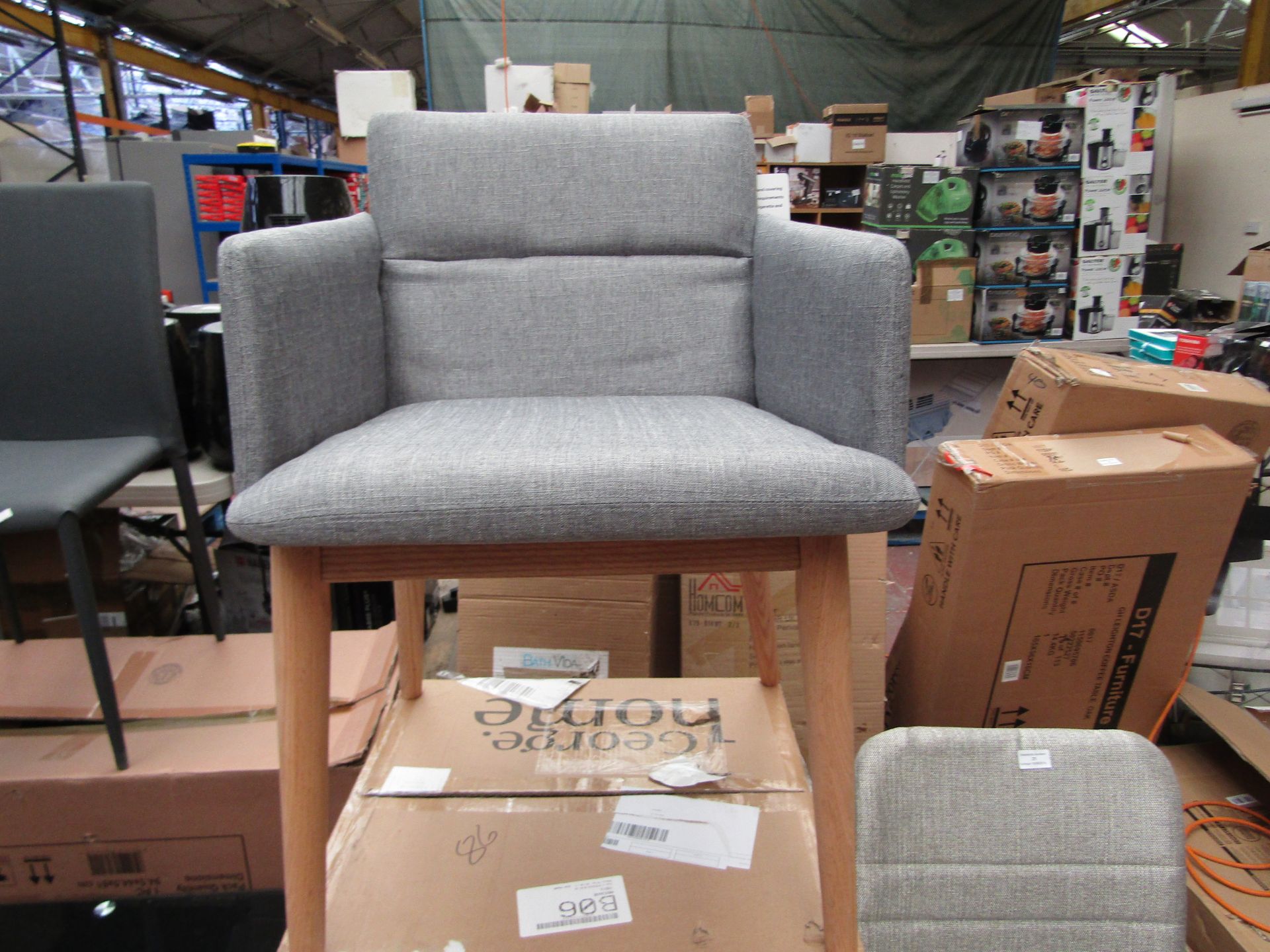 George Home retro upholstered chair, picture is of the item, no major damage and boxed.