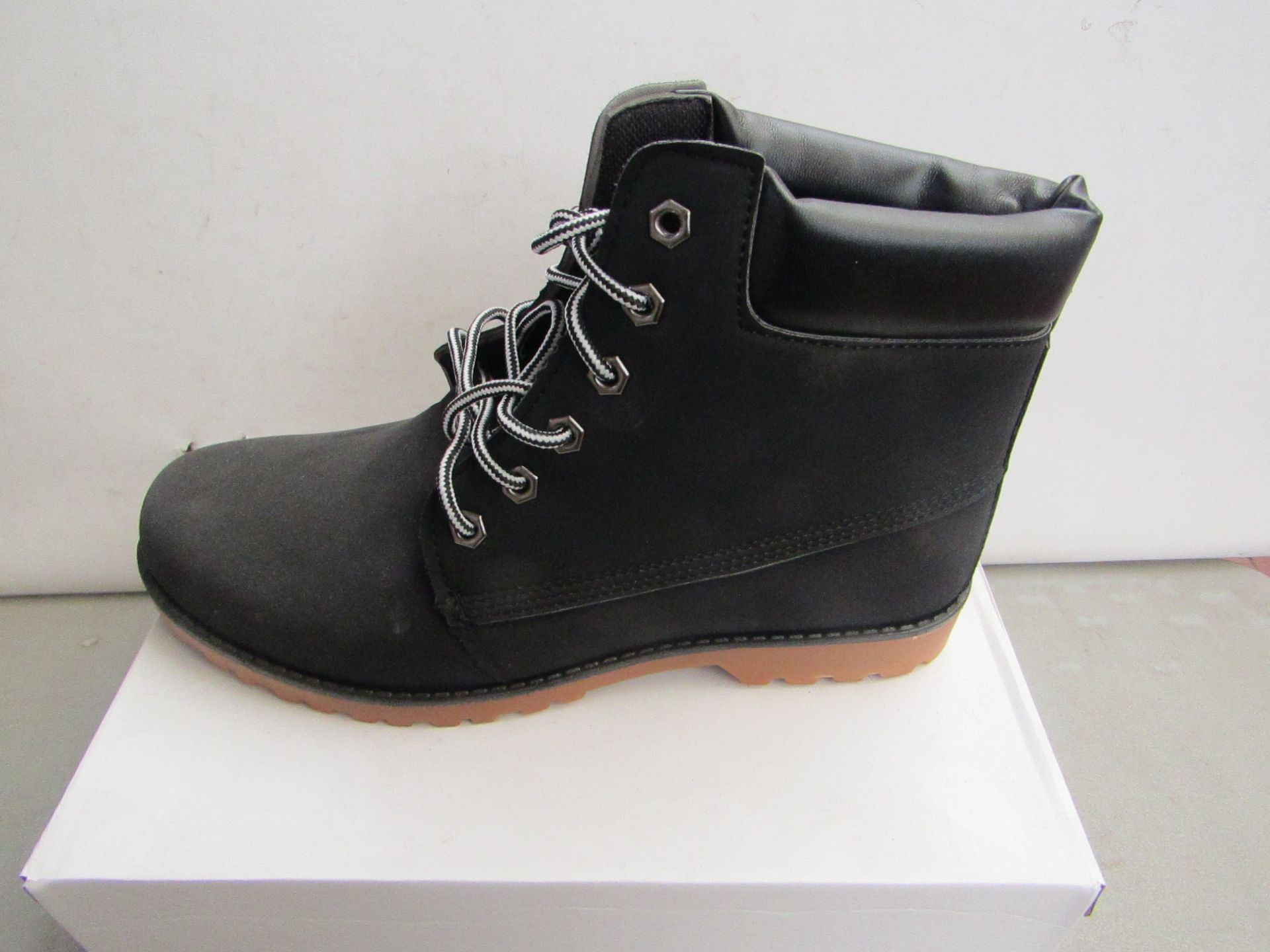 Black Fashion Boots size EU 41 new and boxed.