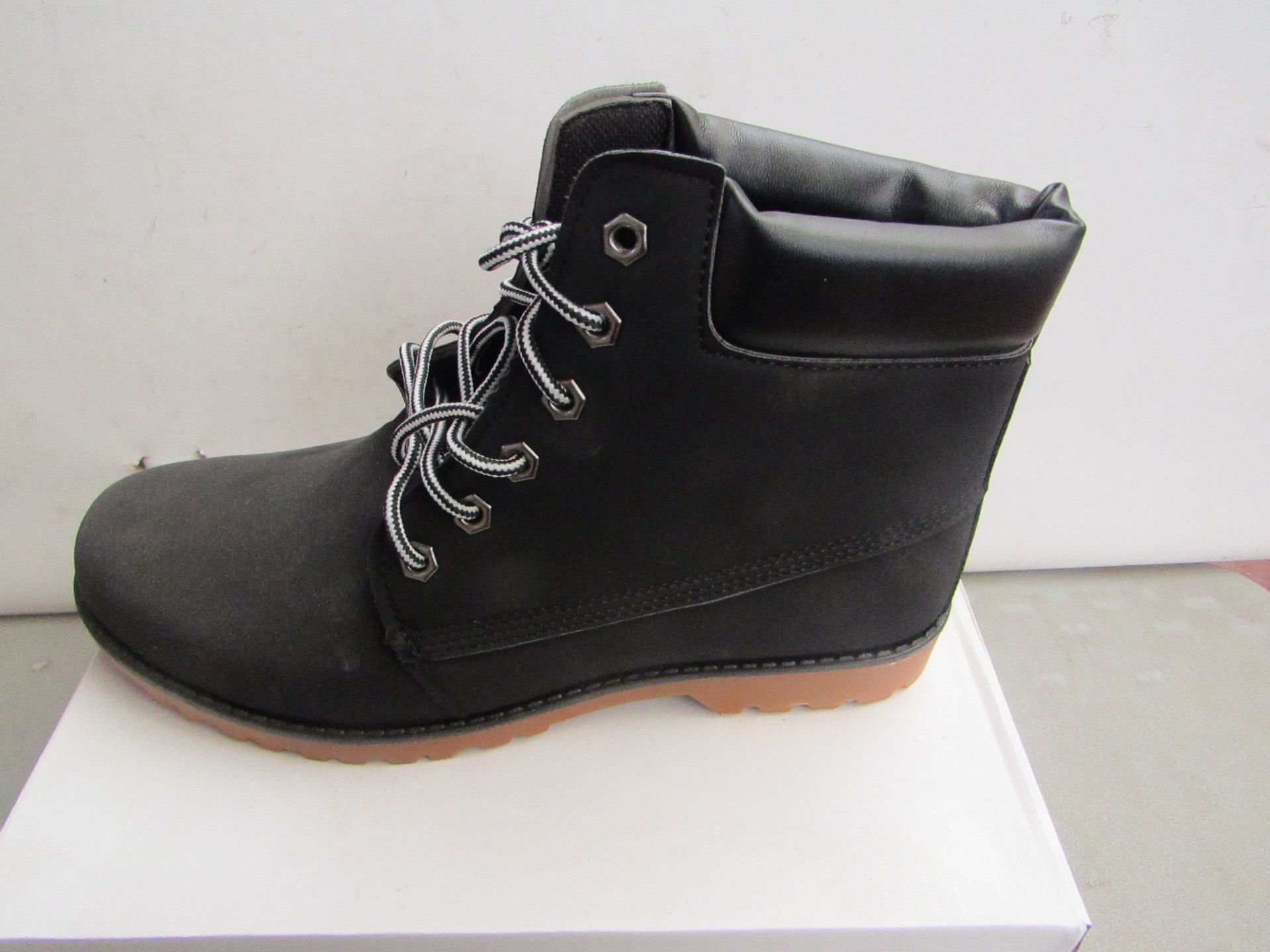 Black Fashion Boots size EU 43 new and boxed.