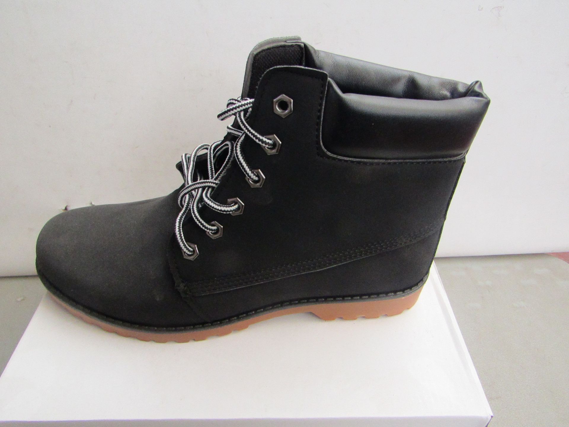 Black Fashion Boots size EU 42 new and boxed.