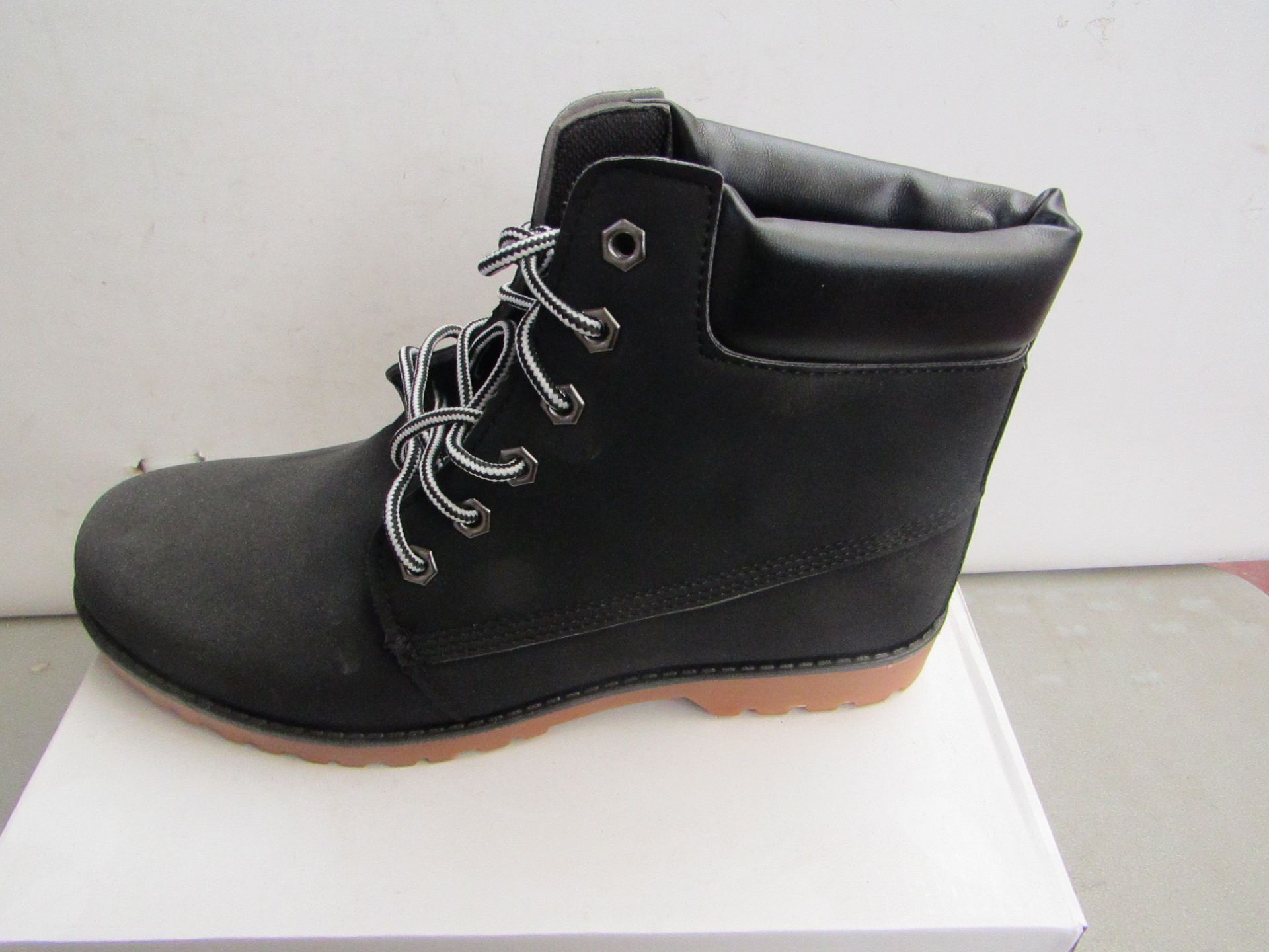 Black Fashion Boots size EU 44 new and boxed.