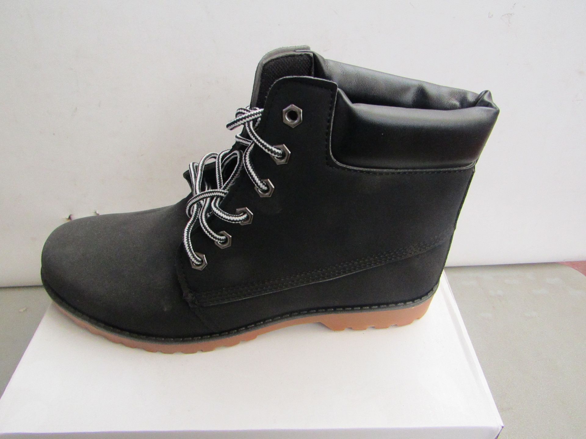 Black Fashion Boots size EU 43 new and boxed.