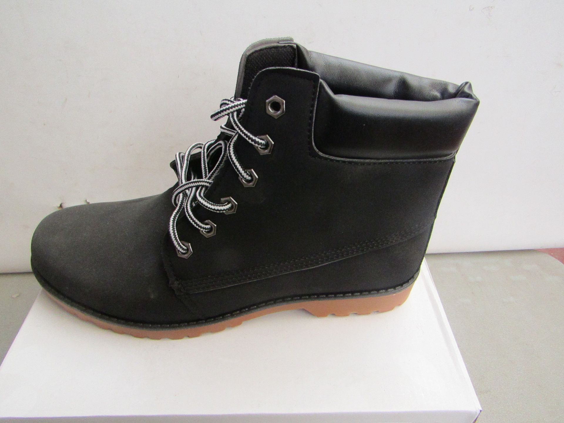 Black Fashion Boots size EU 44 new and boxed.