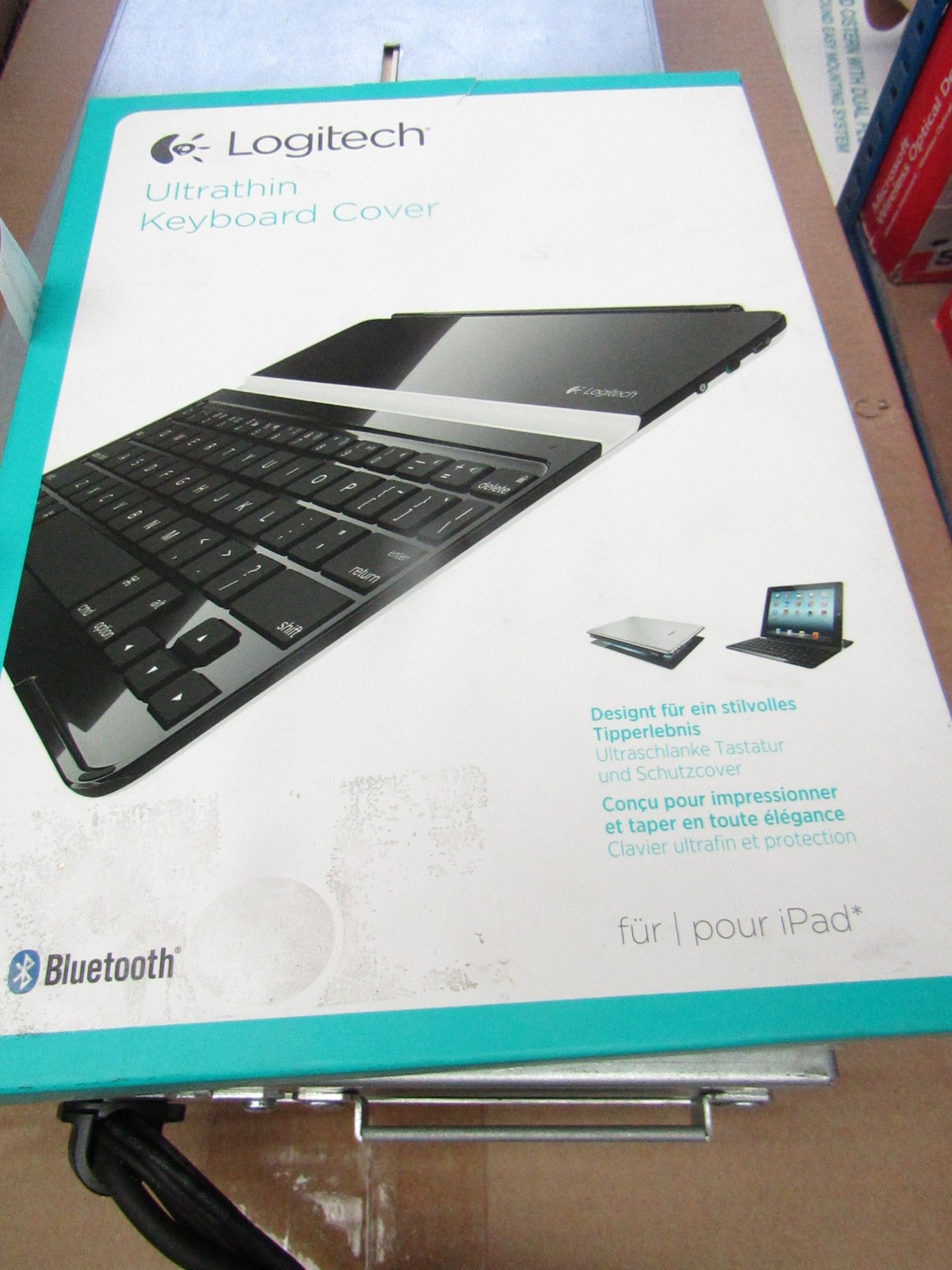 Logitech thin keyboard cover, untested and boxed.