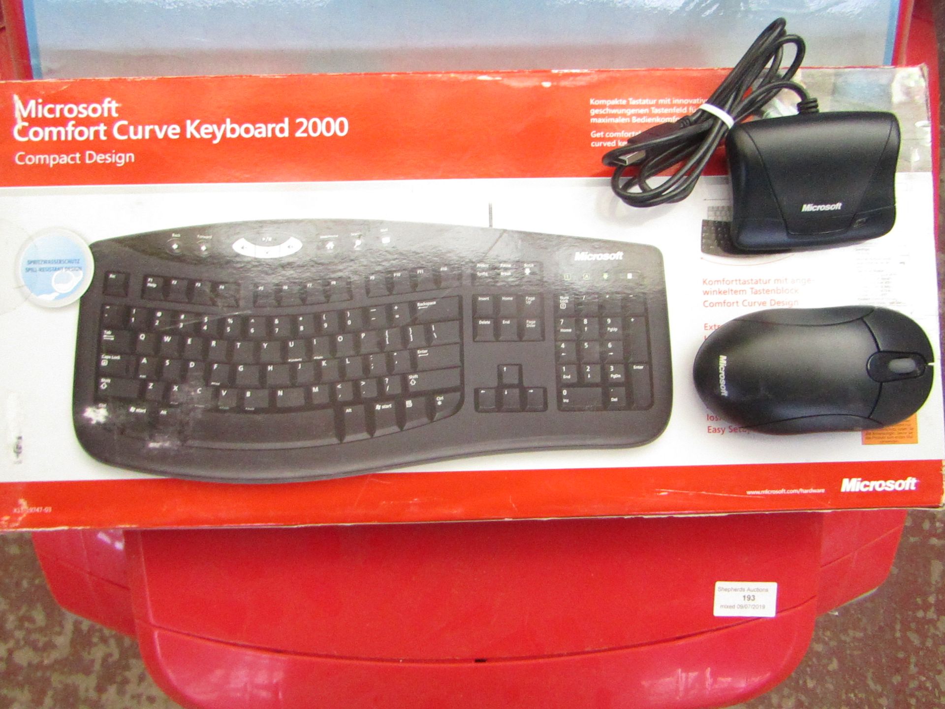 Microsoft comfort curve keyboard 2000 with a Microsoft wireless mouse, tested working and boxed.