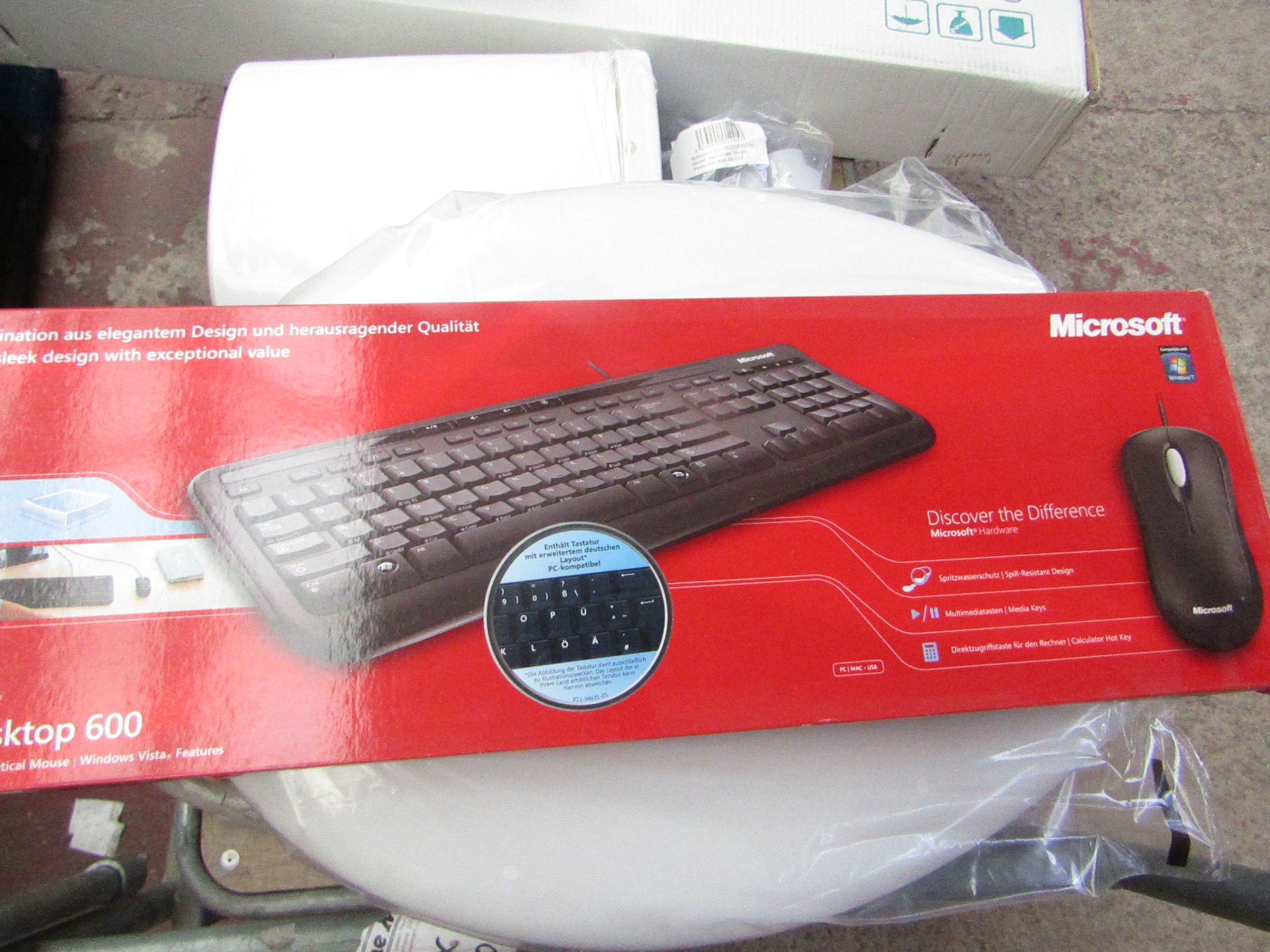 Microsoft wired keyboard with a Microsoft wireless mouse, tested working and boxed.