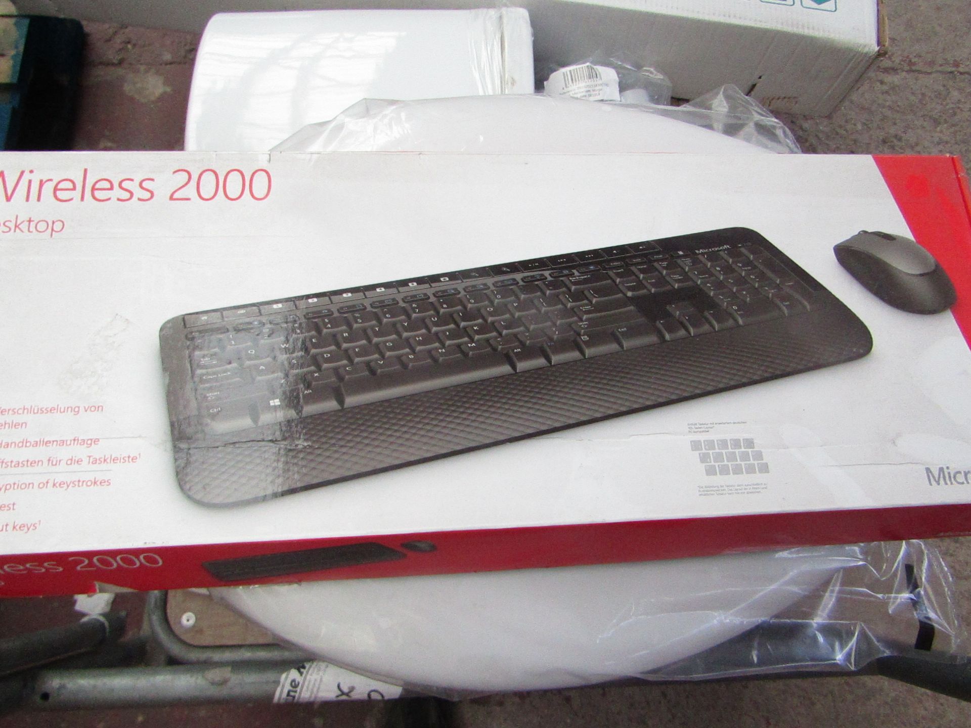 Microsoft wireless keyboard with a Microsoft wireless mouse, tested working and boxed.