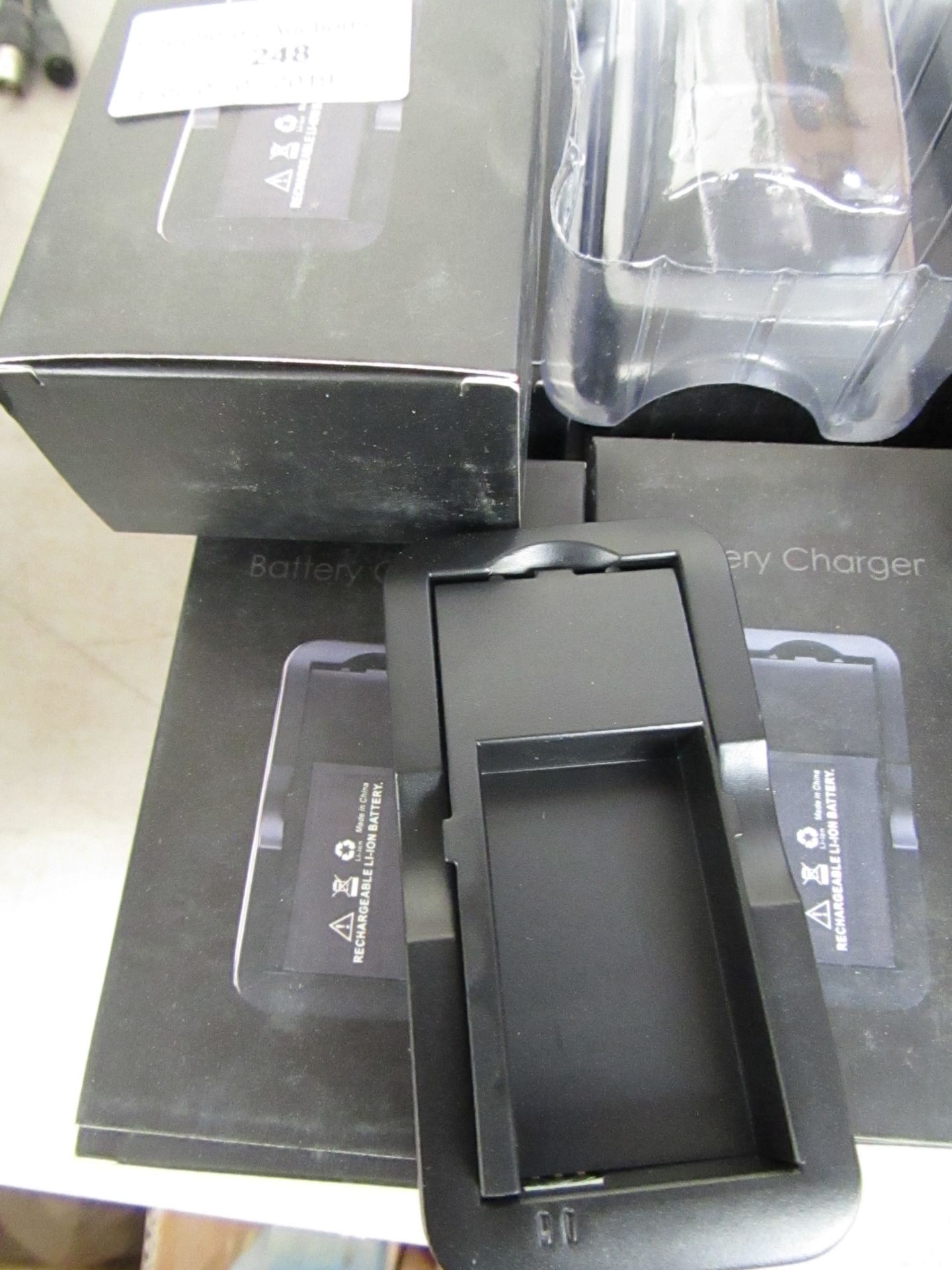 7x Battery Chargers, new and boxed